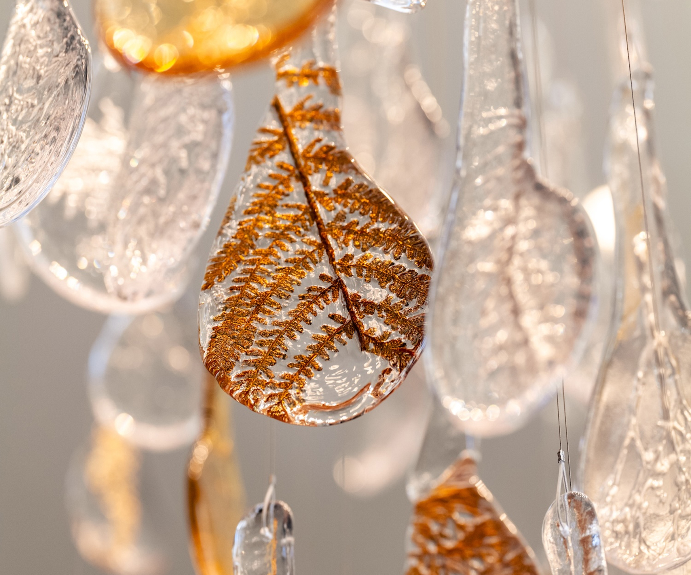 RAINFALL glass droplet with a botanical impression, close view
