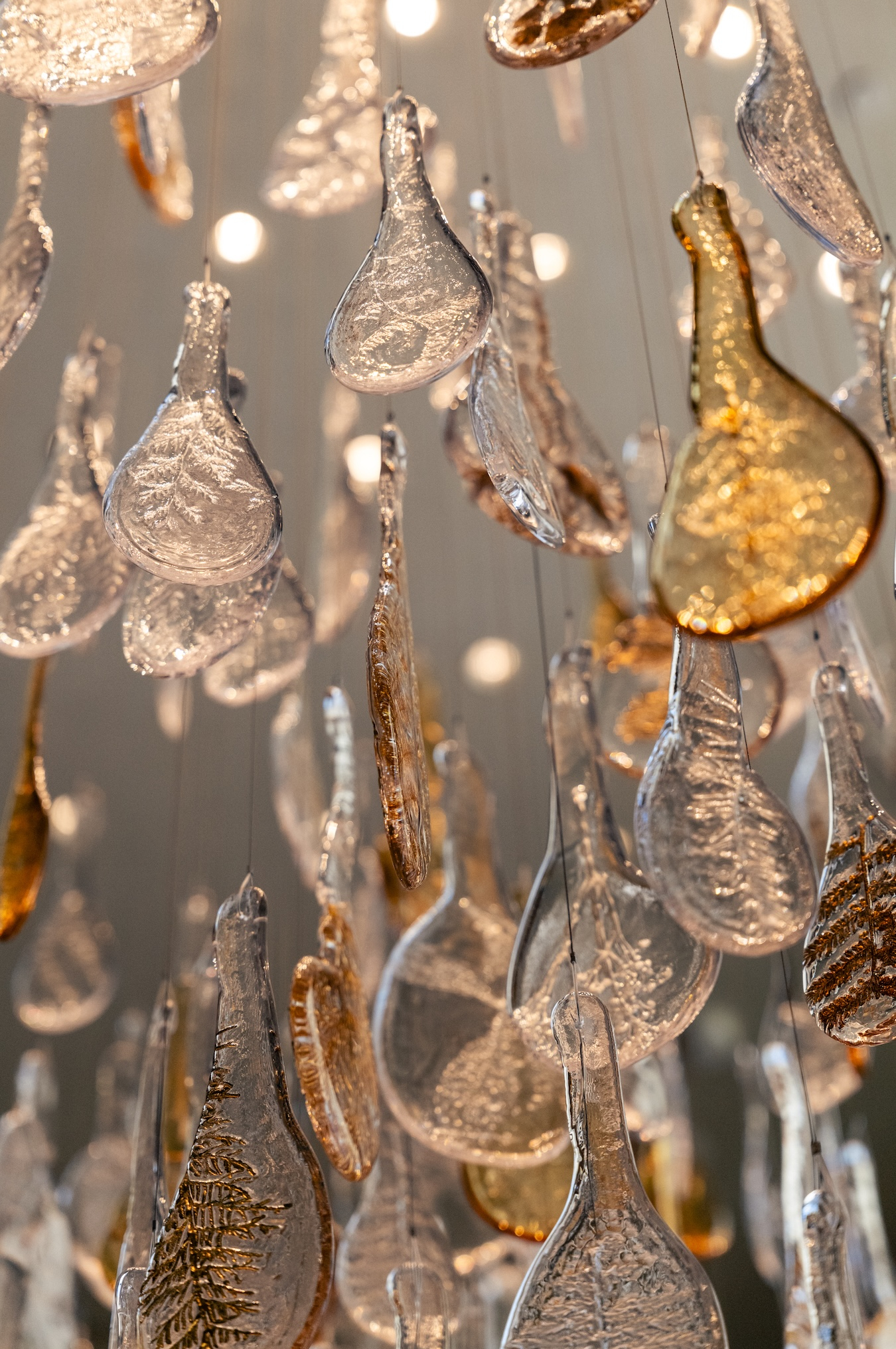 RAINFALL clear and amber droplets hung at unequal heights