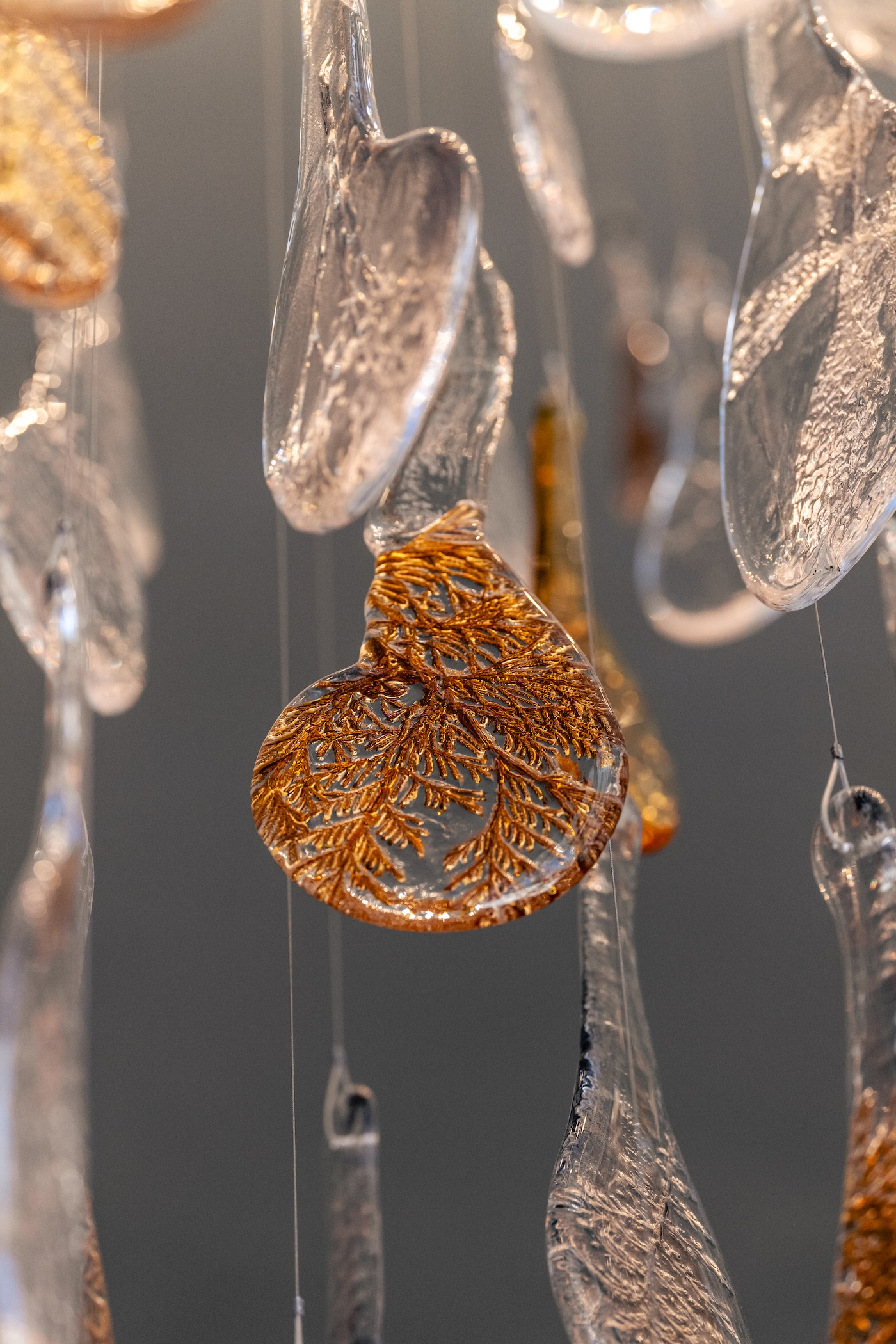 RAINFALL droplet chandelier, amber pieces in close detail