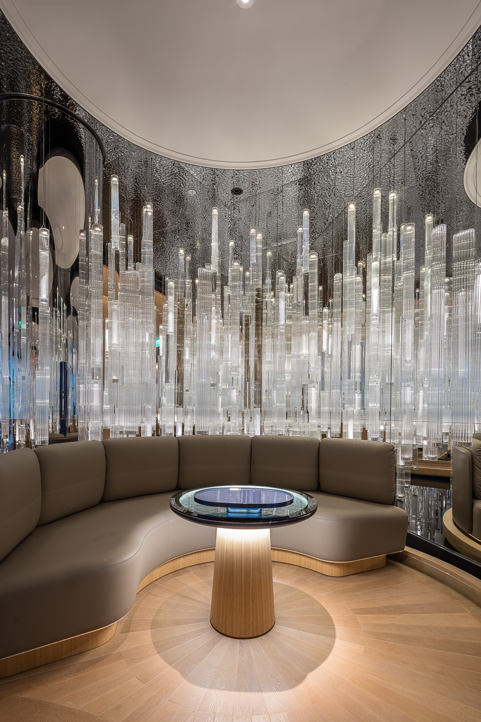 GROVE glass installation reflected in the table top