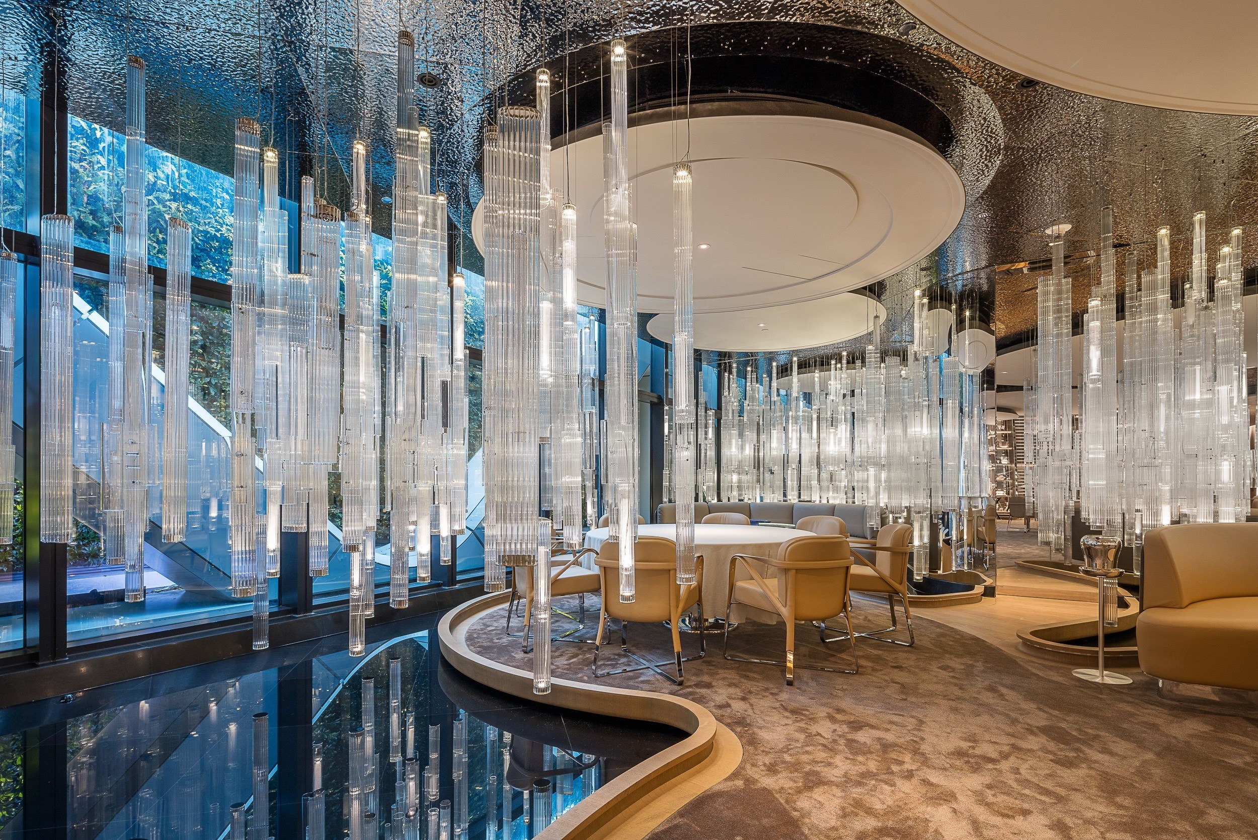 GROVE glass stems below the dark textured ceiling