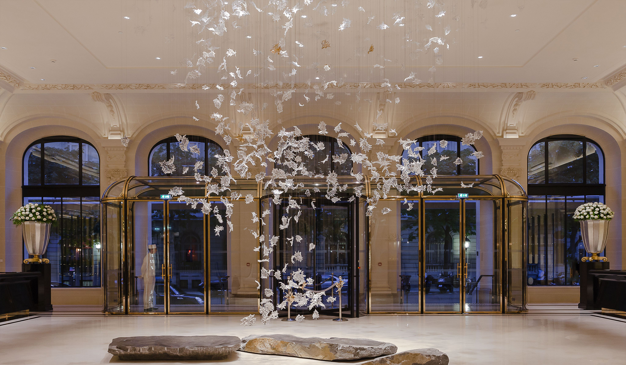 ACER glass leaf installation by SHUCHUANG, elements falling through the arrival hall