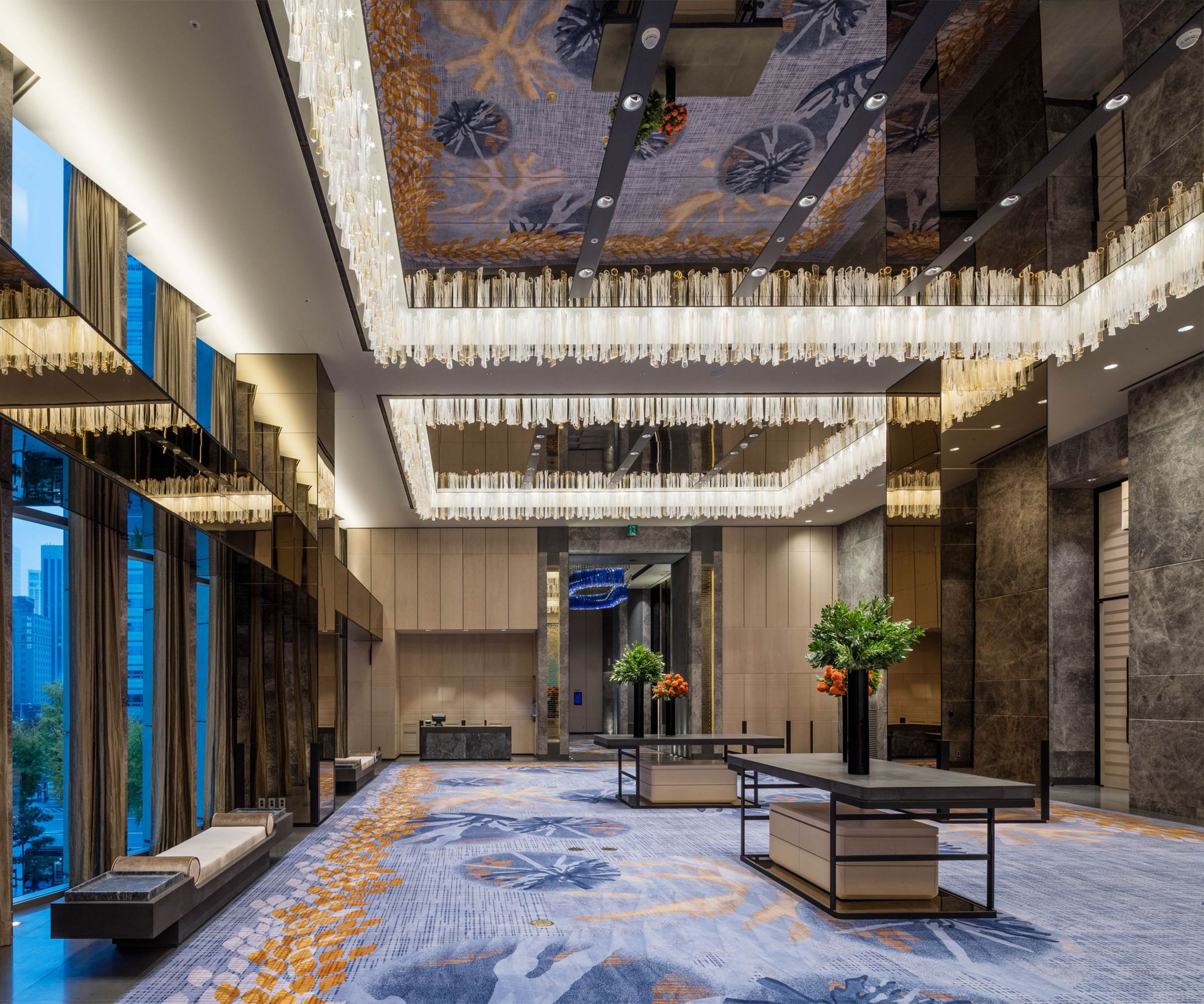 LUXE ceiling light seen down the length of the ballroom