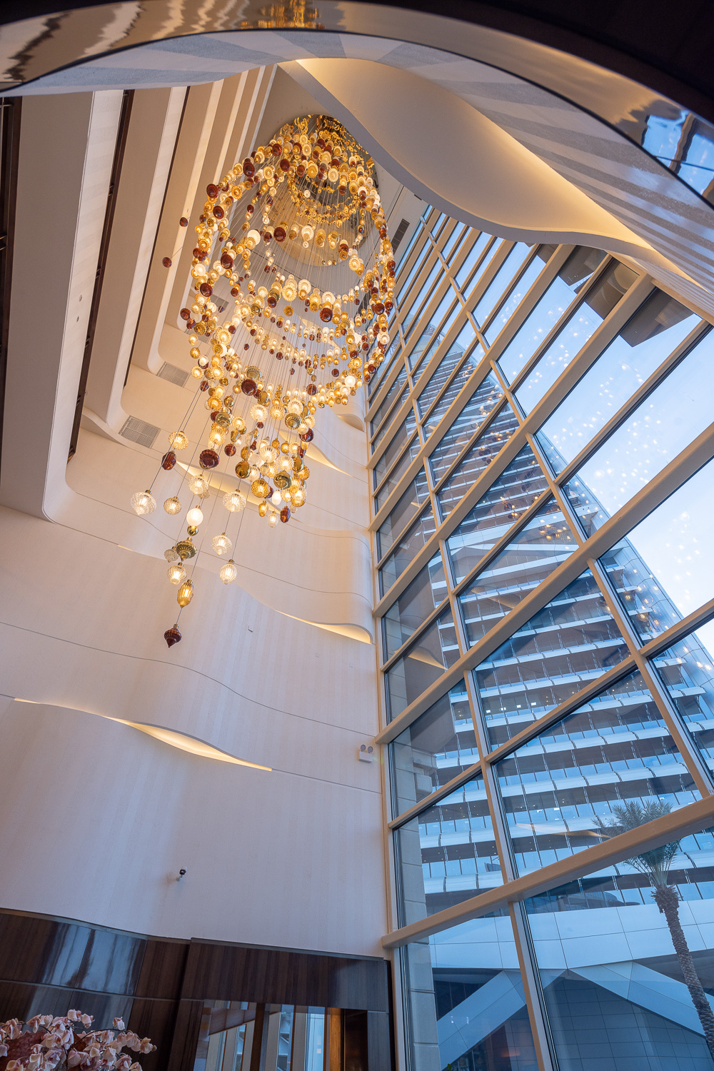 BUTTONWOOD glass discs seen against the stair soffit