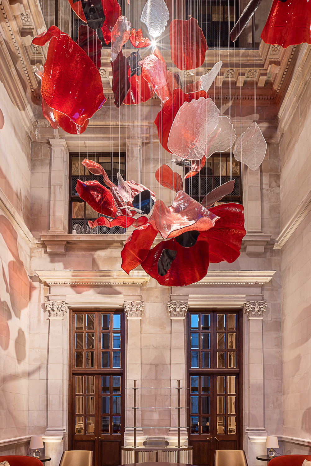 ROSSO installation seen from the hall floor, red marks on the walls