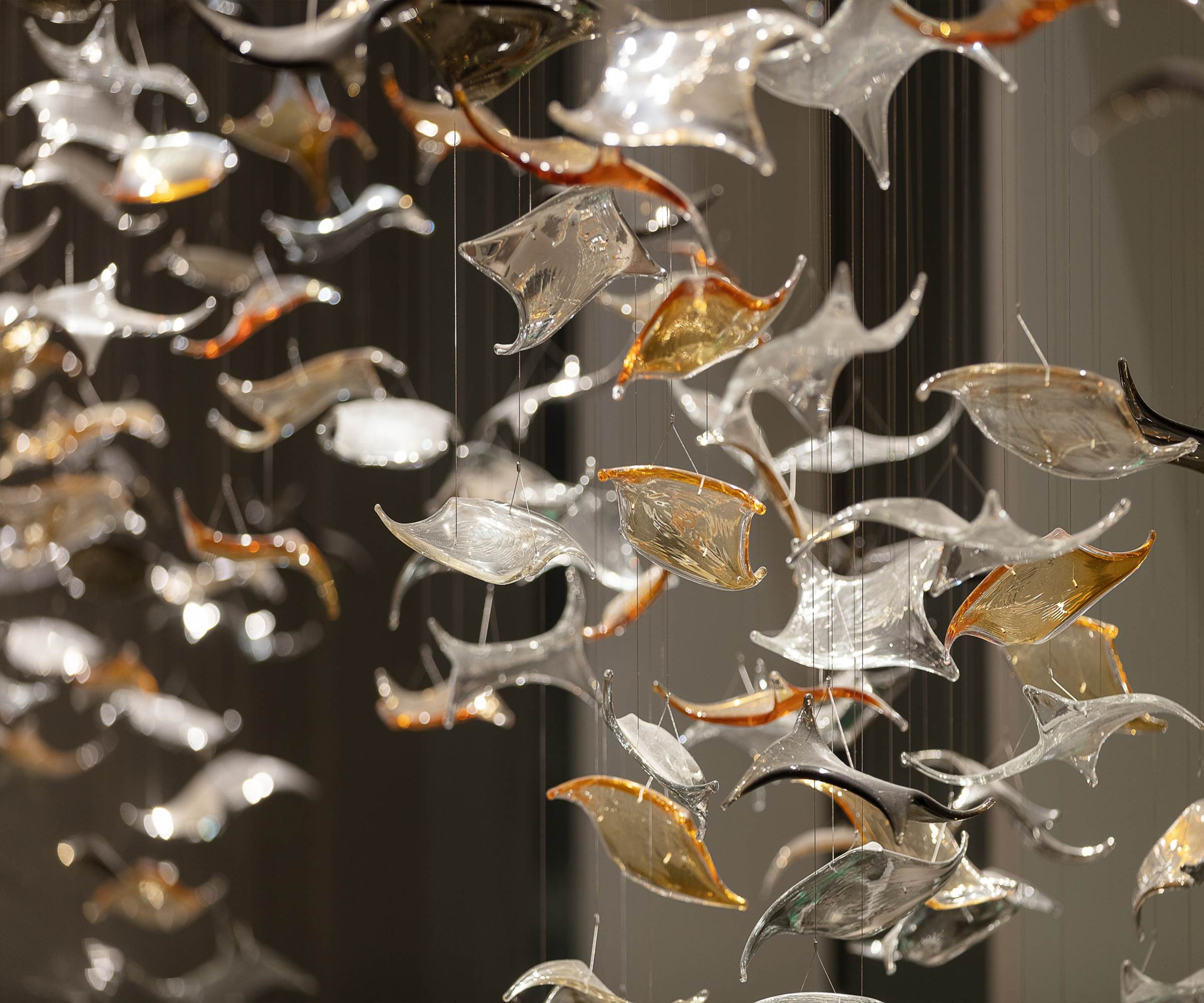KOI blue, green and amber glass leaves in close view