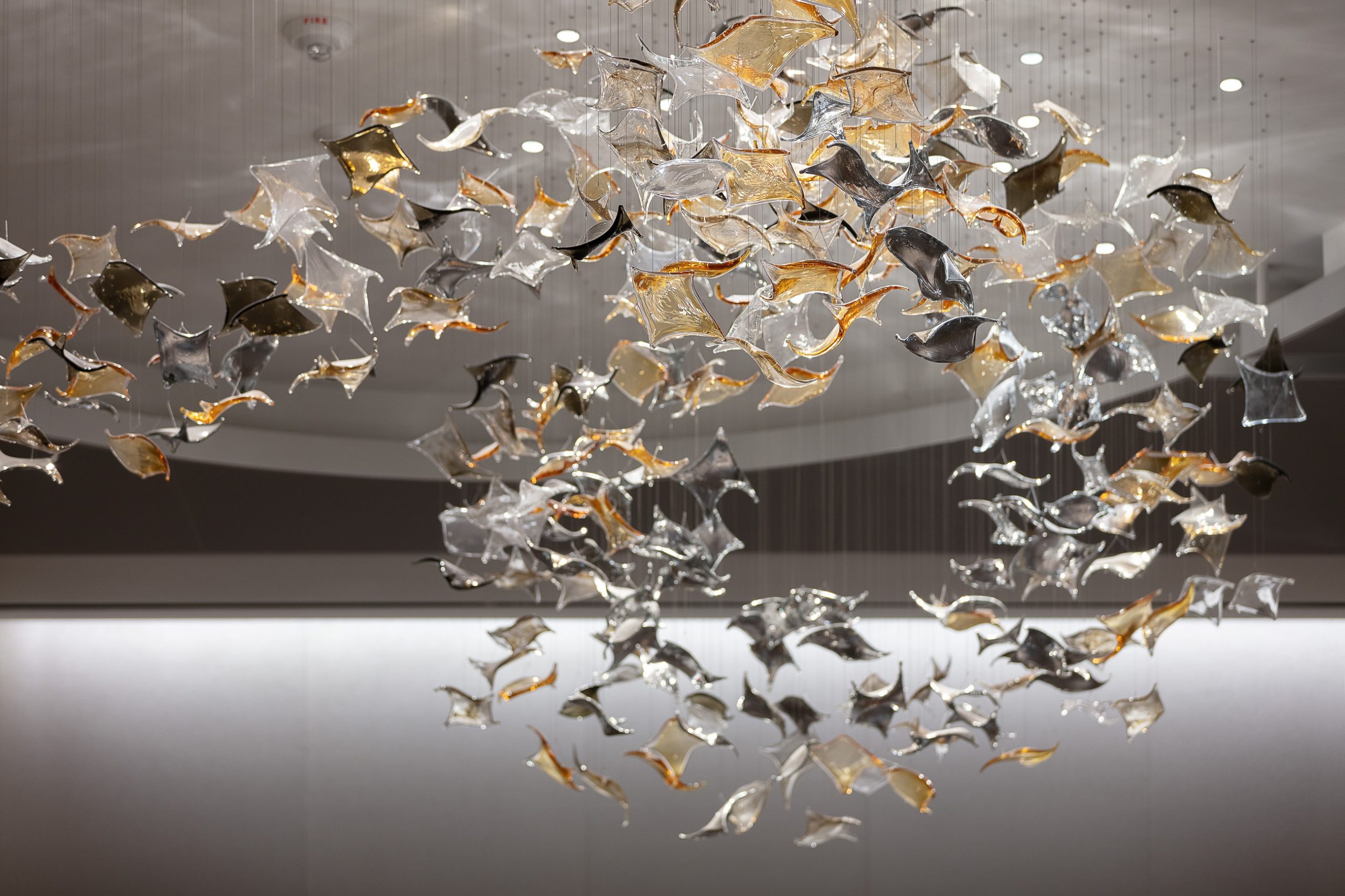 KOI chandelier falling the full height of a lounge void