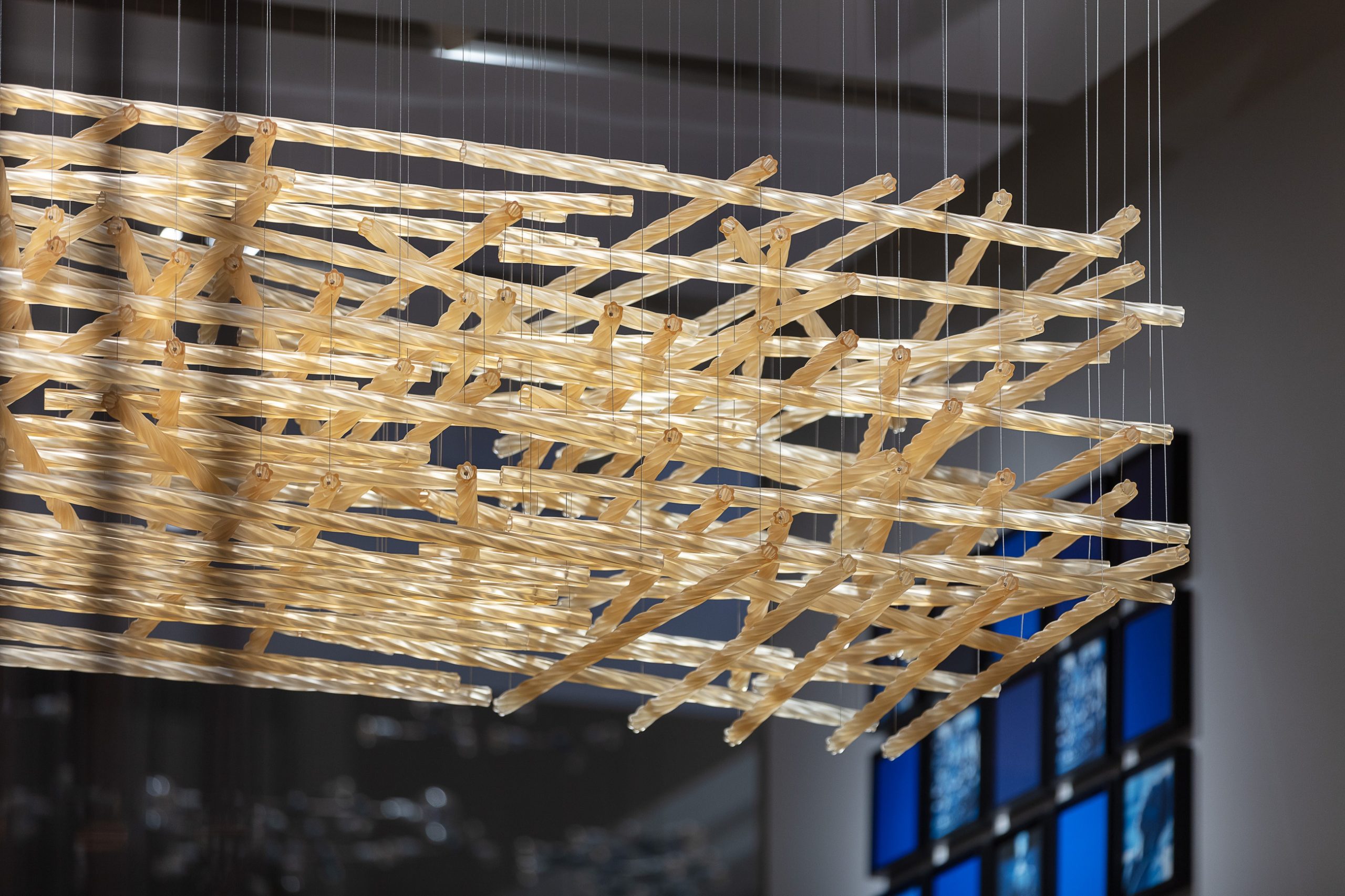 WOVEN nest chandelier seen across the reception