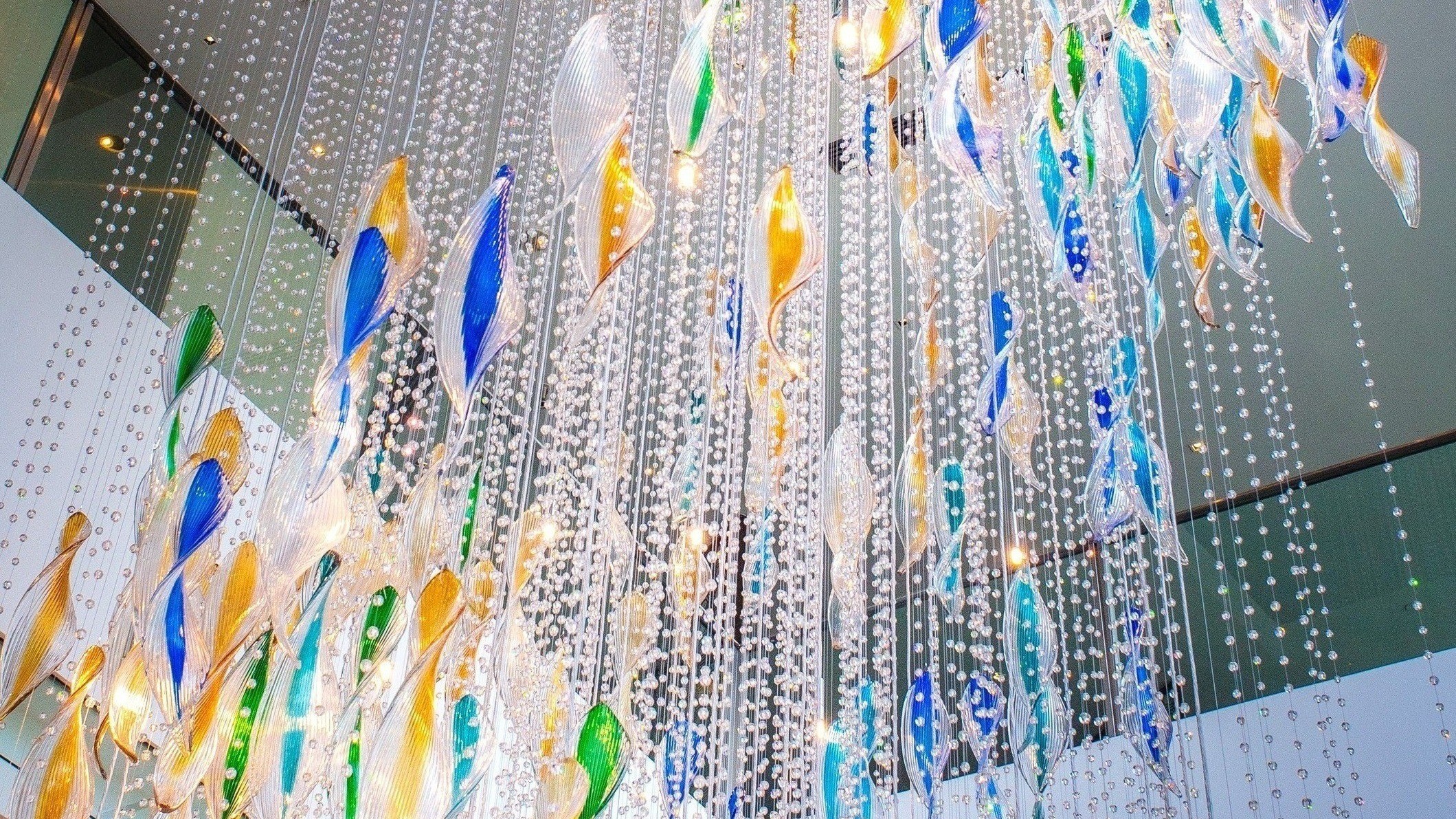 VIBRANT chandelier seen from the atrium lounge below
