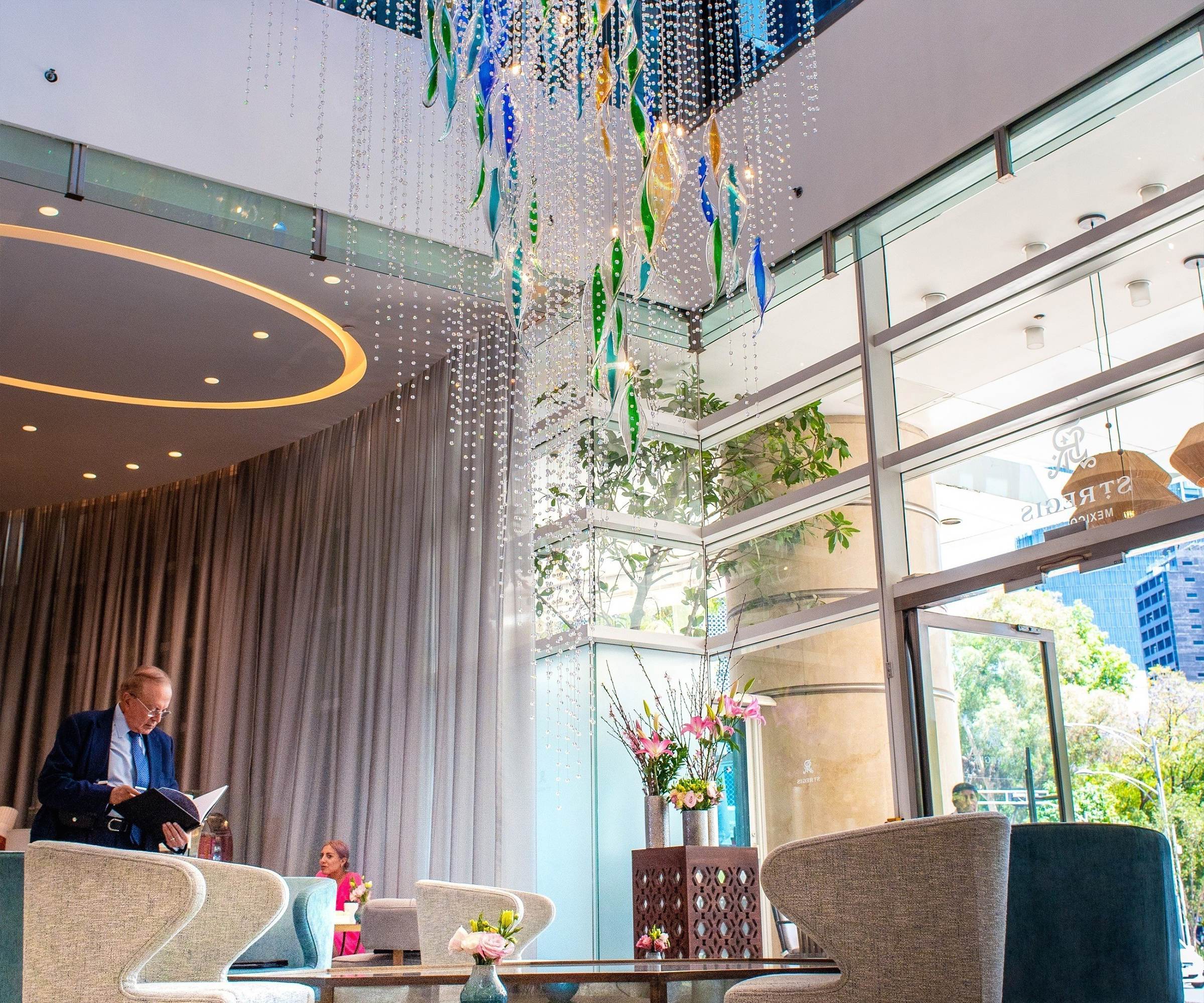 VIBRANT clear bead curtain with coloured cores, seen against the glazing