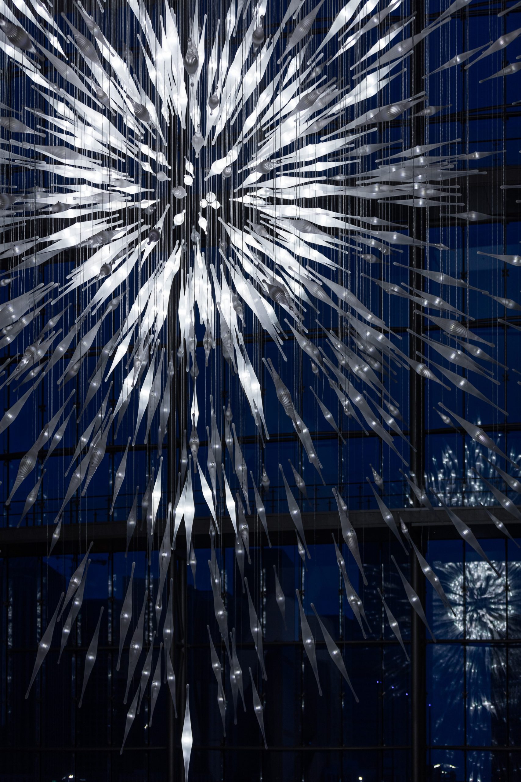 STARBURST chandelier seen from the escalator level