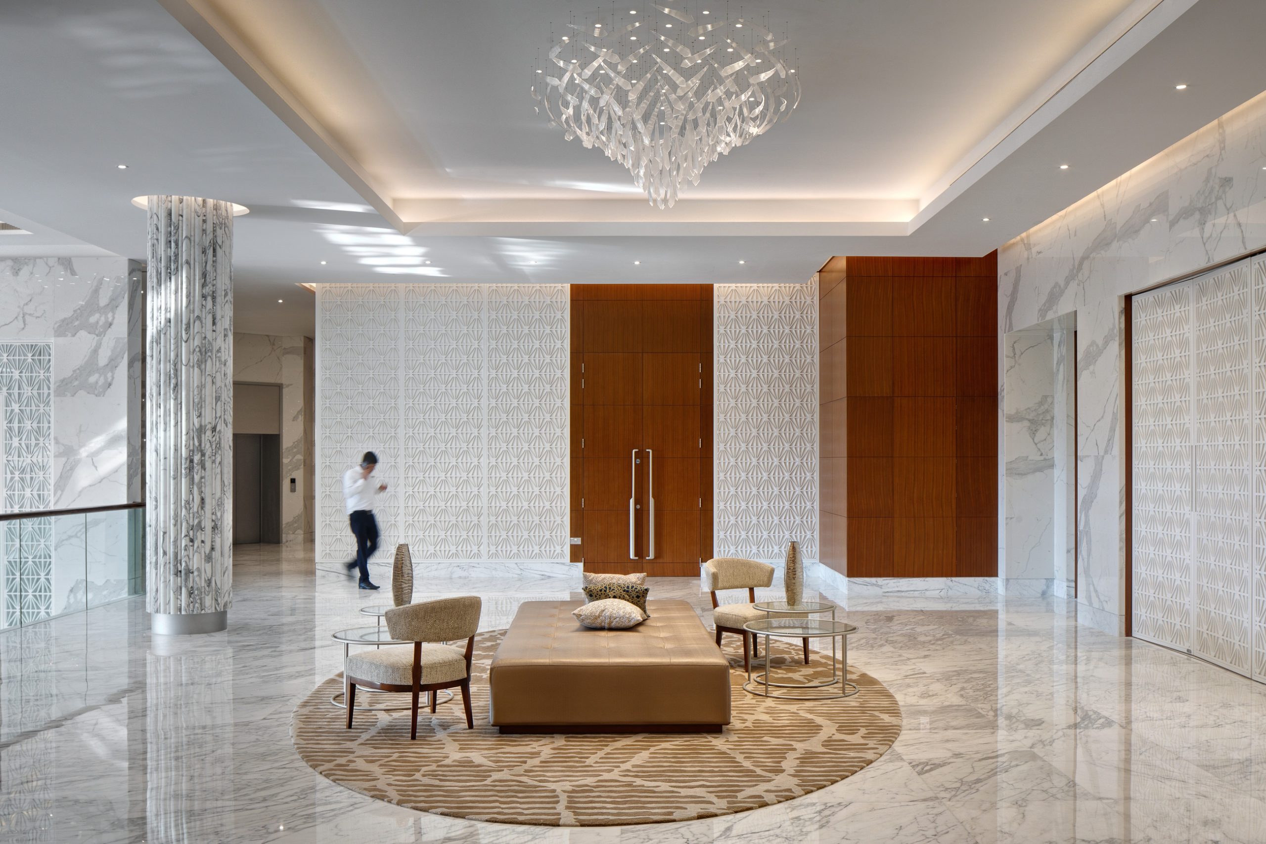 VALERIA chandelier above the lobby lounge seating