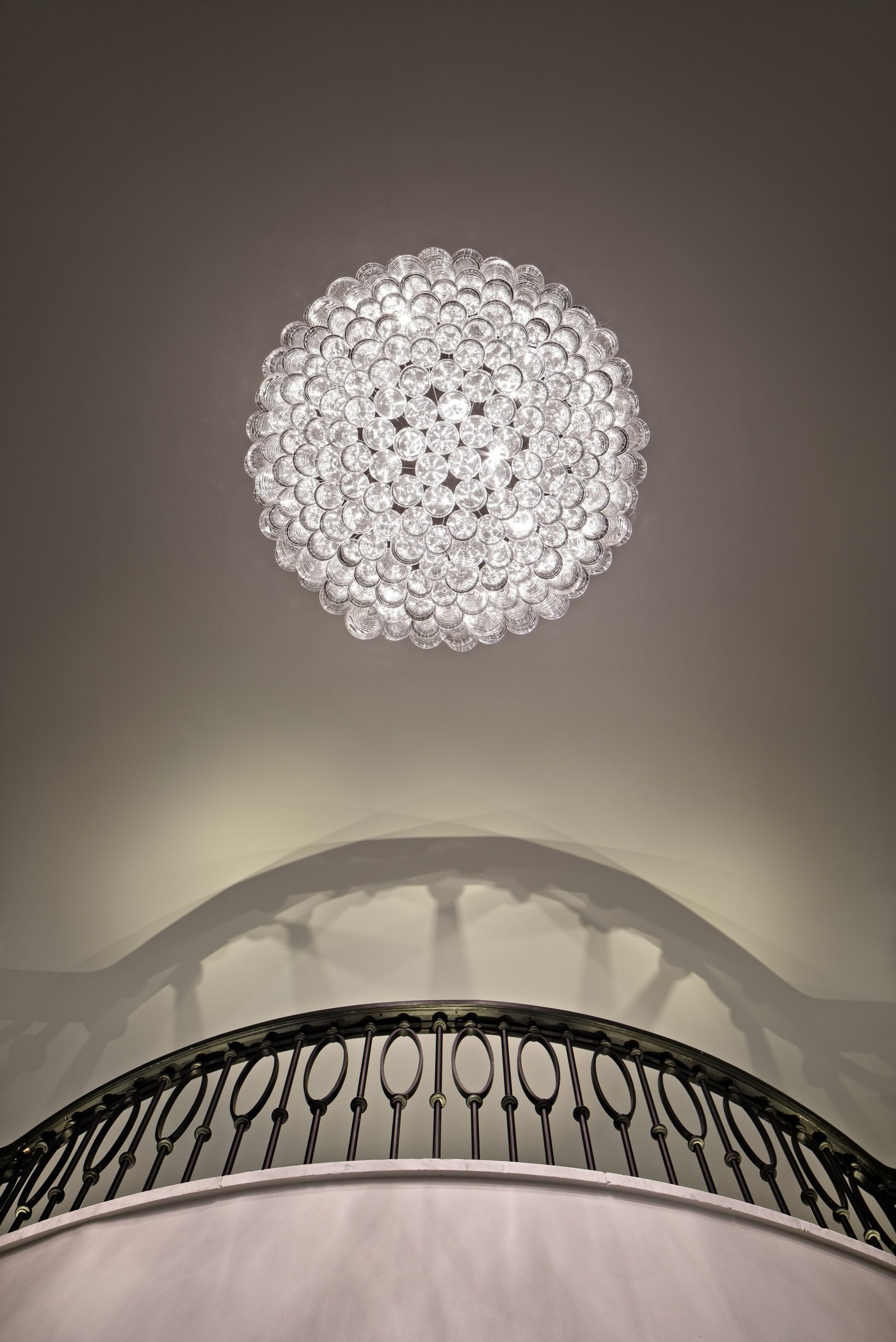 TEAROOM dome chandelier above a round salon