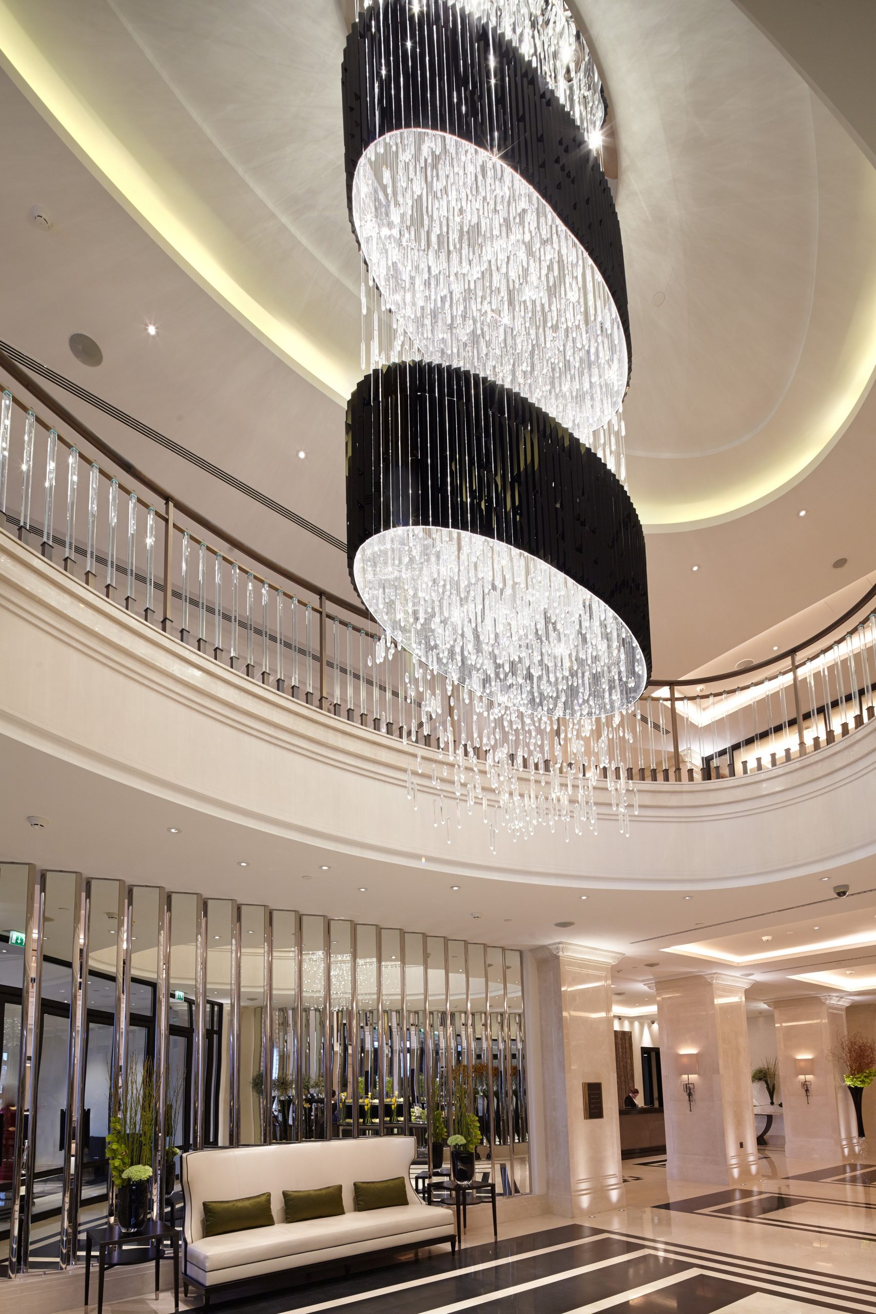 RAINFALL drum crystal chandelier by SHUCHUANG, dark drum and crystal fall over a rotunda
