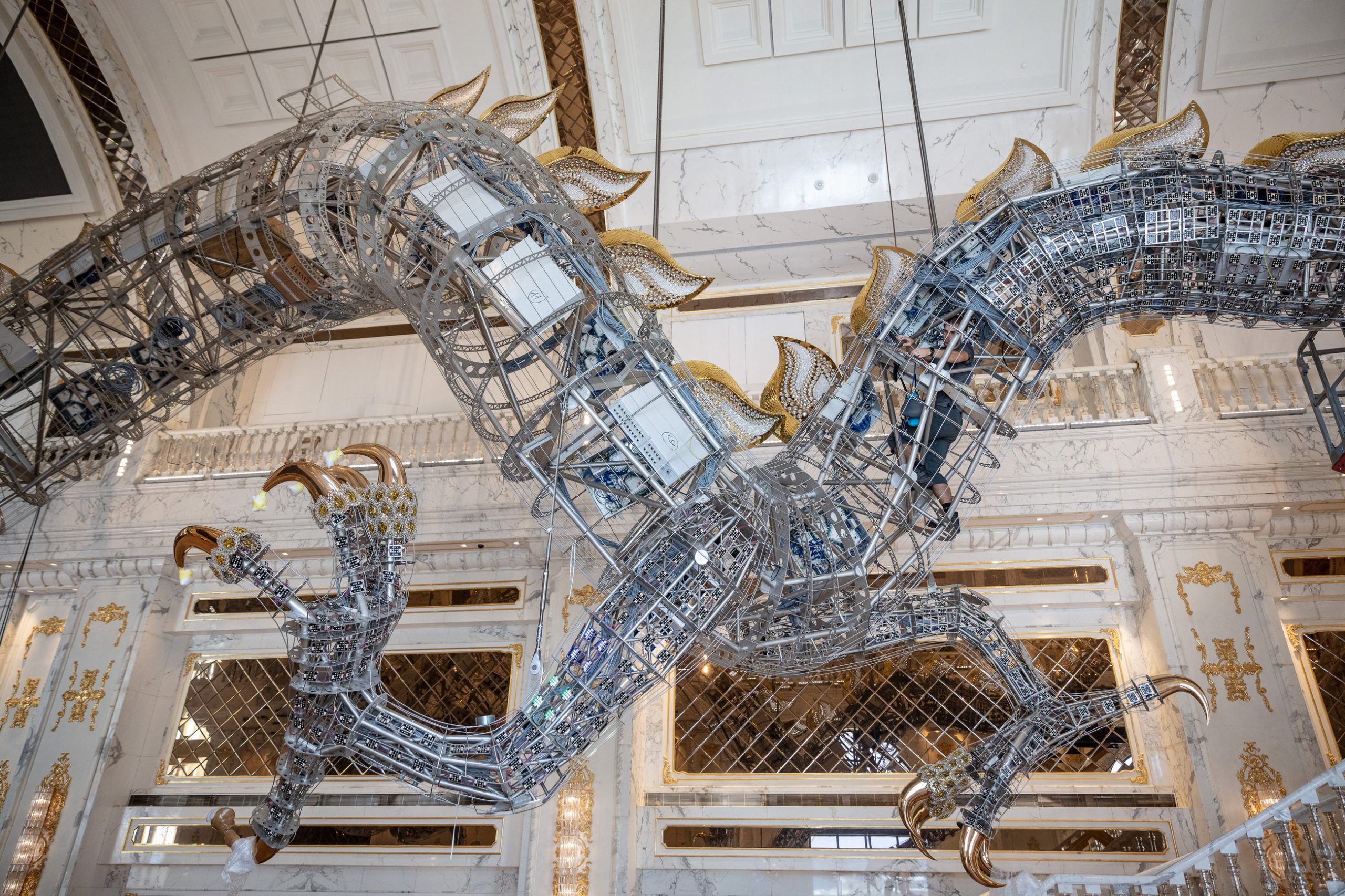 AUGUSTUS chandelier, close view of the overlapping crystal scales