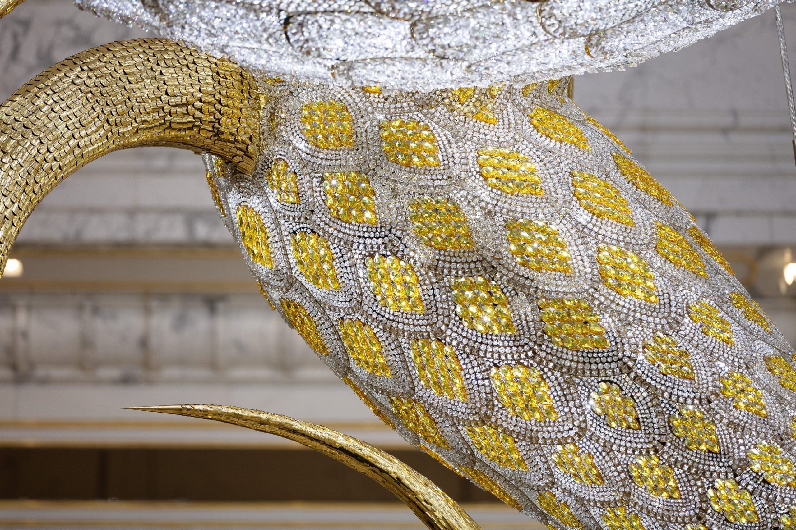 AUGUSTUS chandelier, eye and brow detail in gilded metal