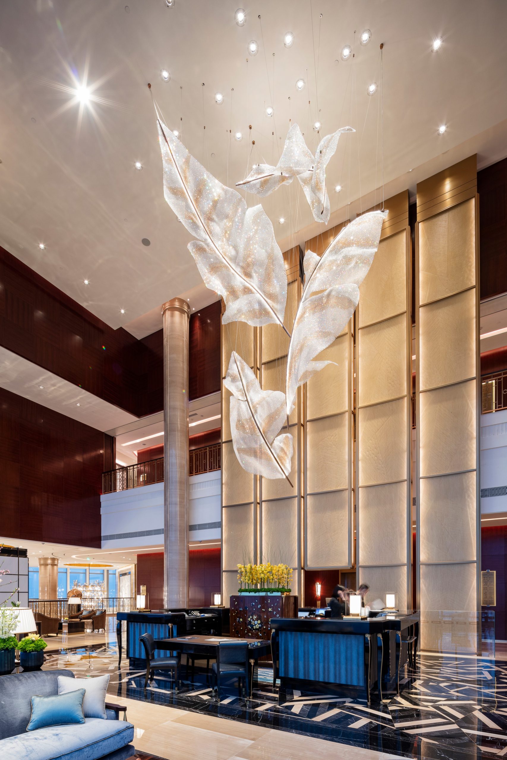 ARIA feather chandelier over the lobby seating