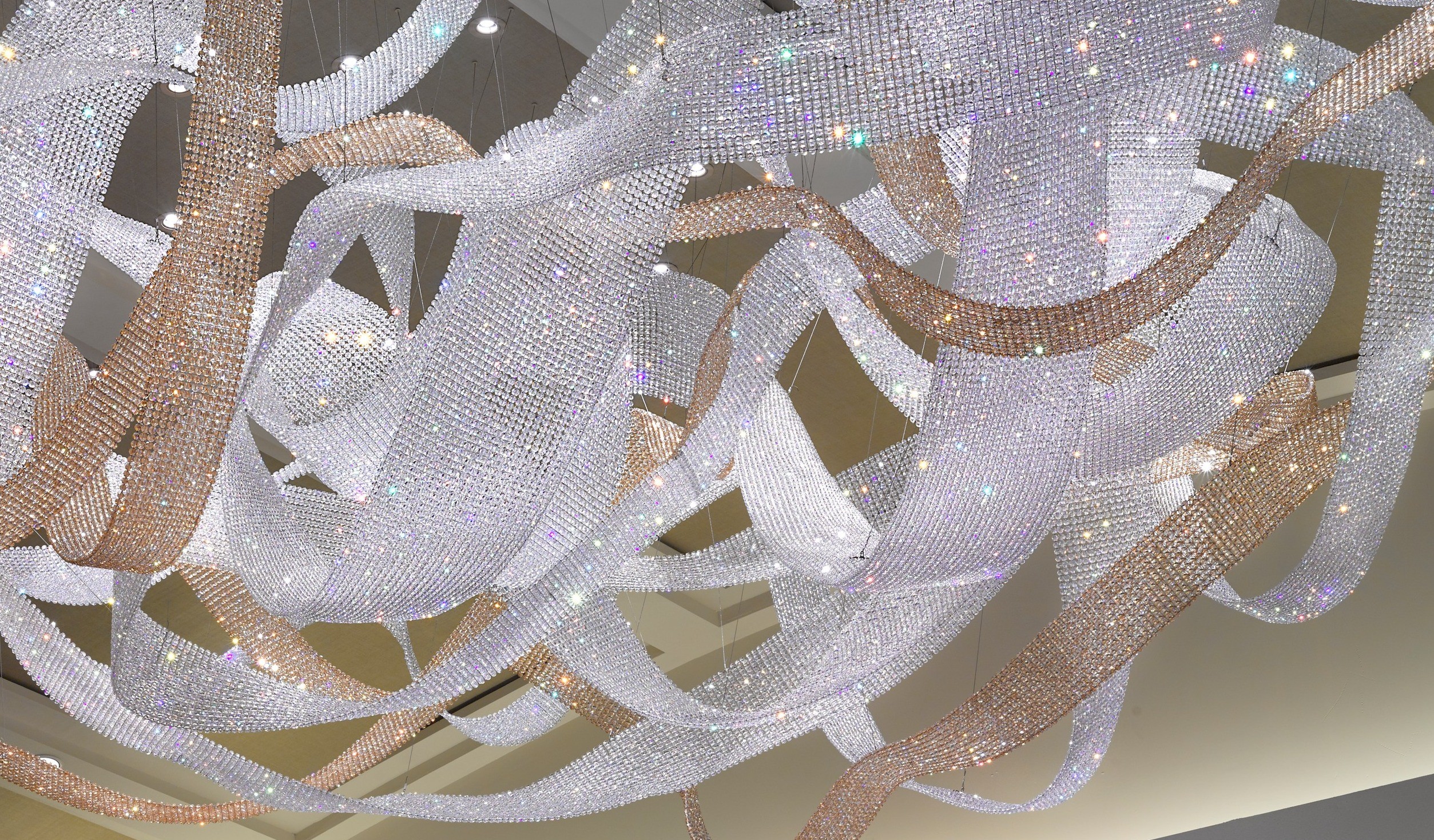 NEXUS crystal ribbon chandelier by SHUCHUANG, close view of the crossing bands