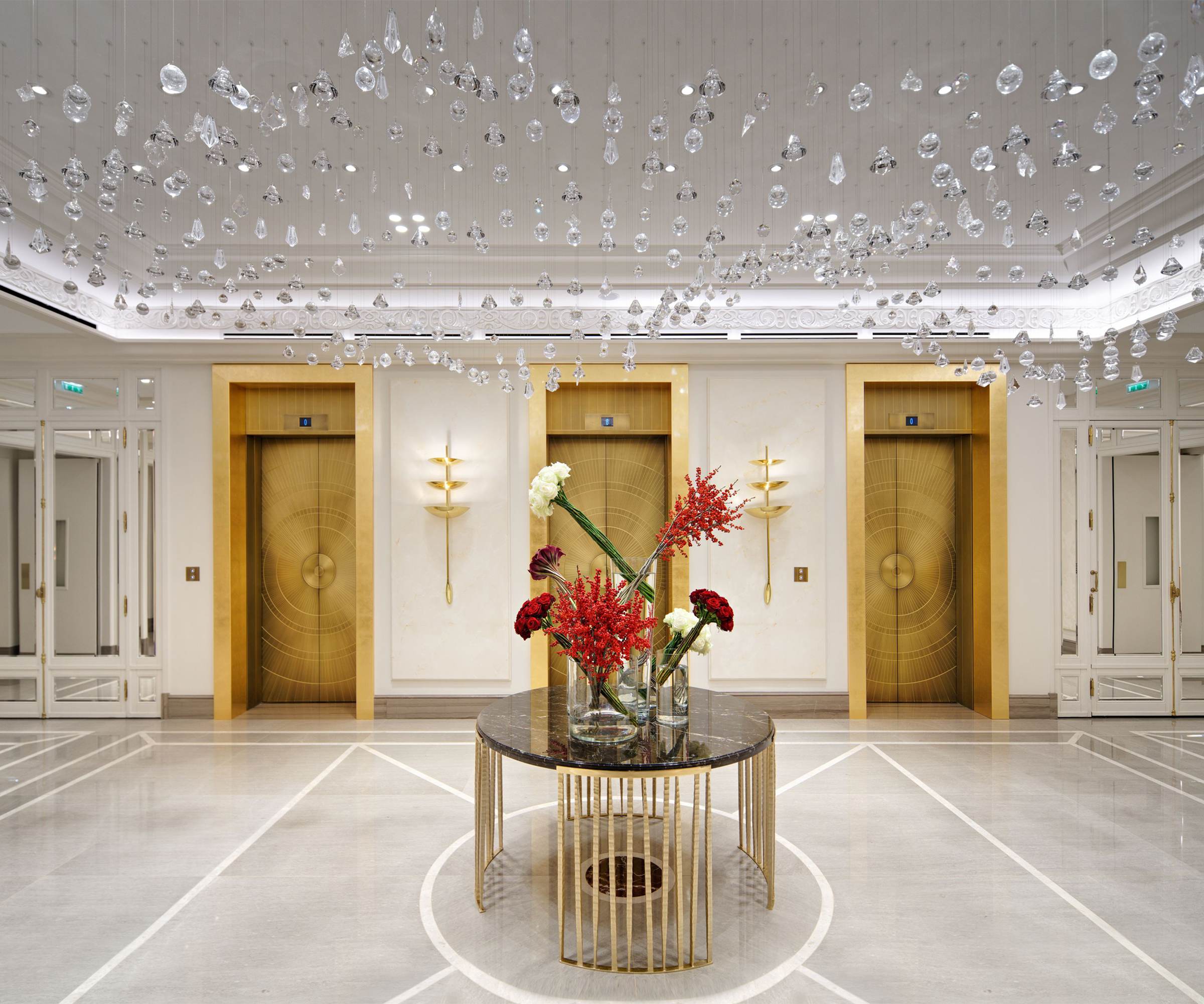 GLACIER drop ceiling light above a hotel lift lobby