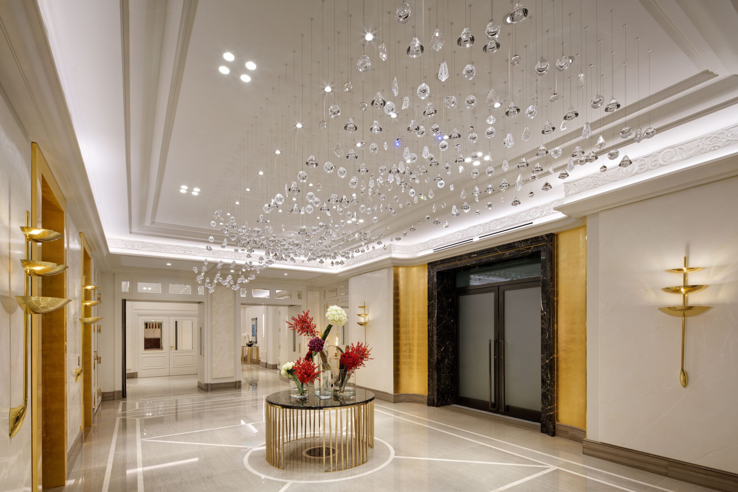 GLACIER ceiling light above the lobby console table