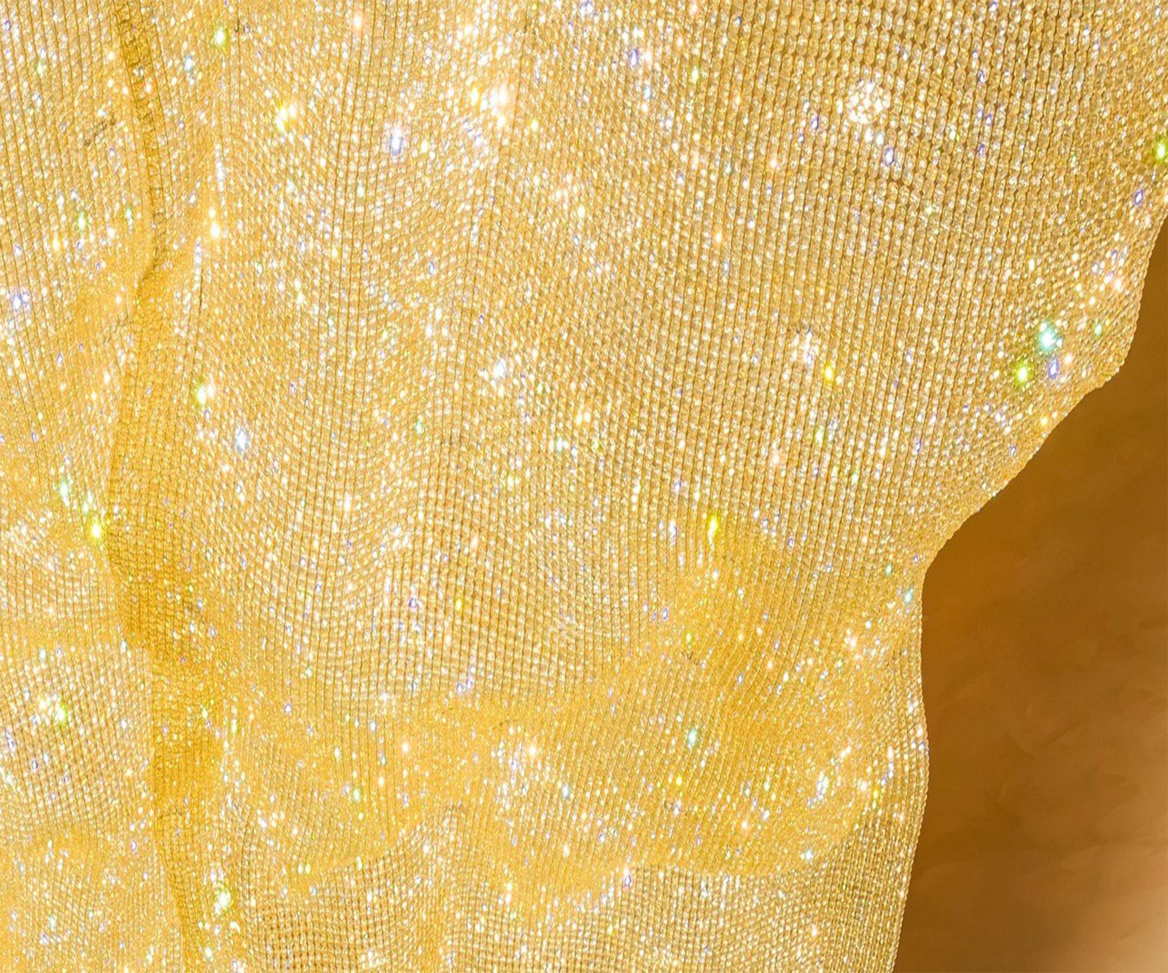 AURORA gold crystal ceiling light by SHUCHUANG, close view of the amber mesh