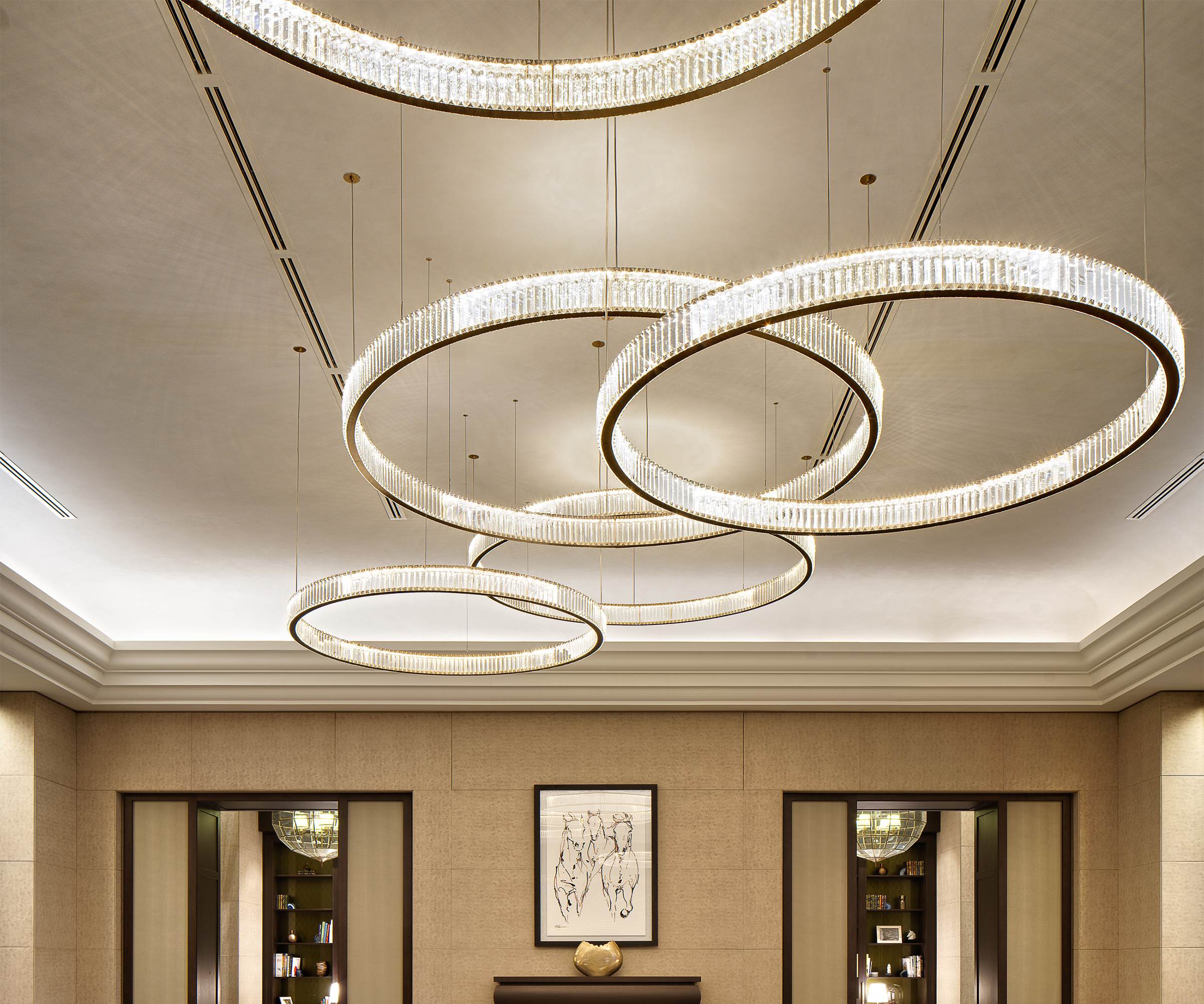 ORBIT crystal rings seen against a pale ceiling