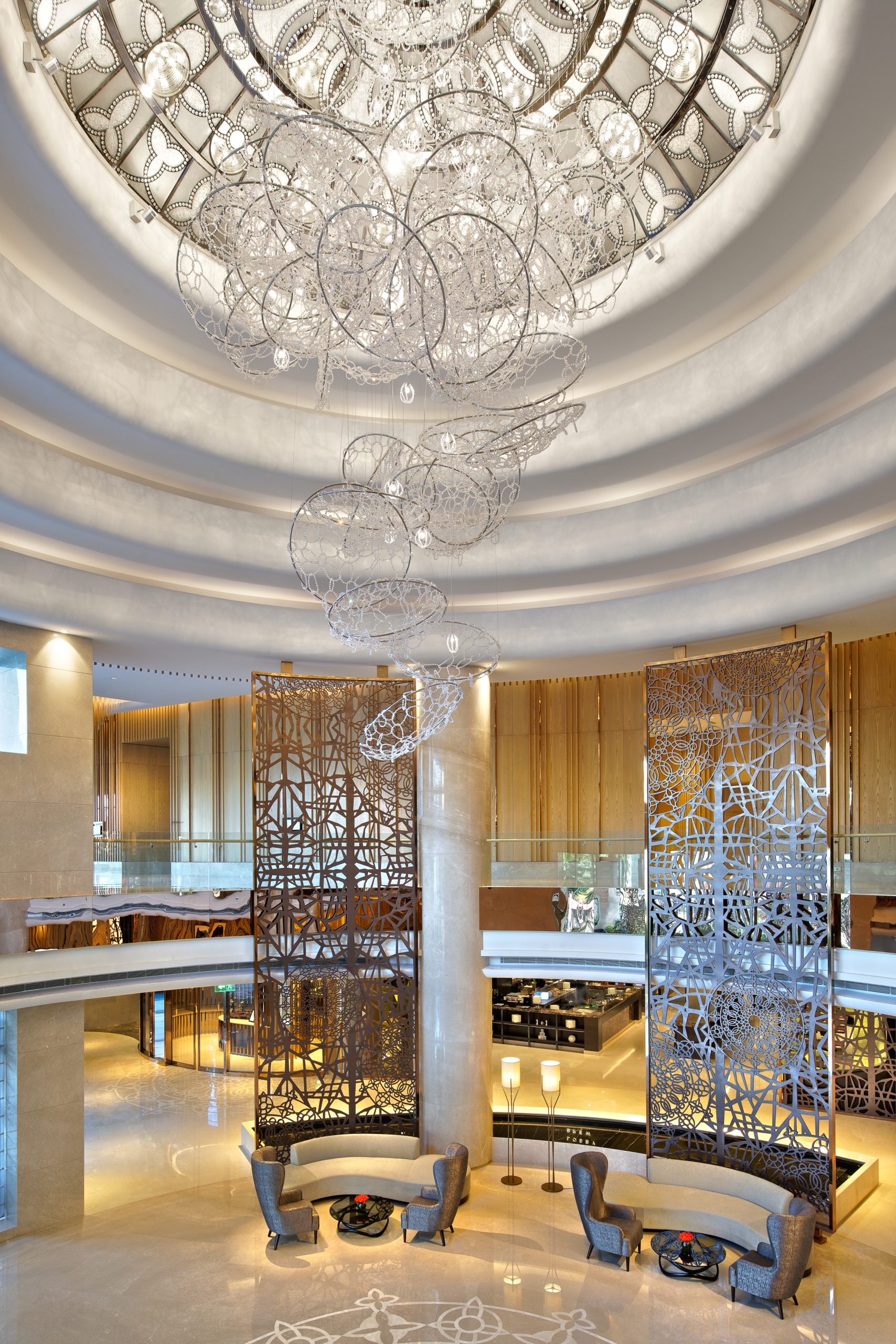 CIRRUS lace chandelier seen from the lobby floor