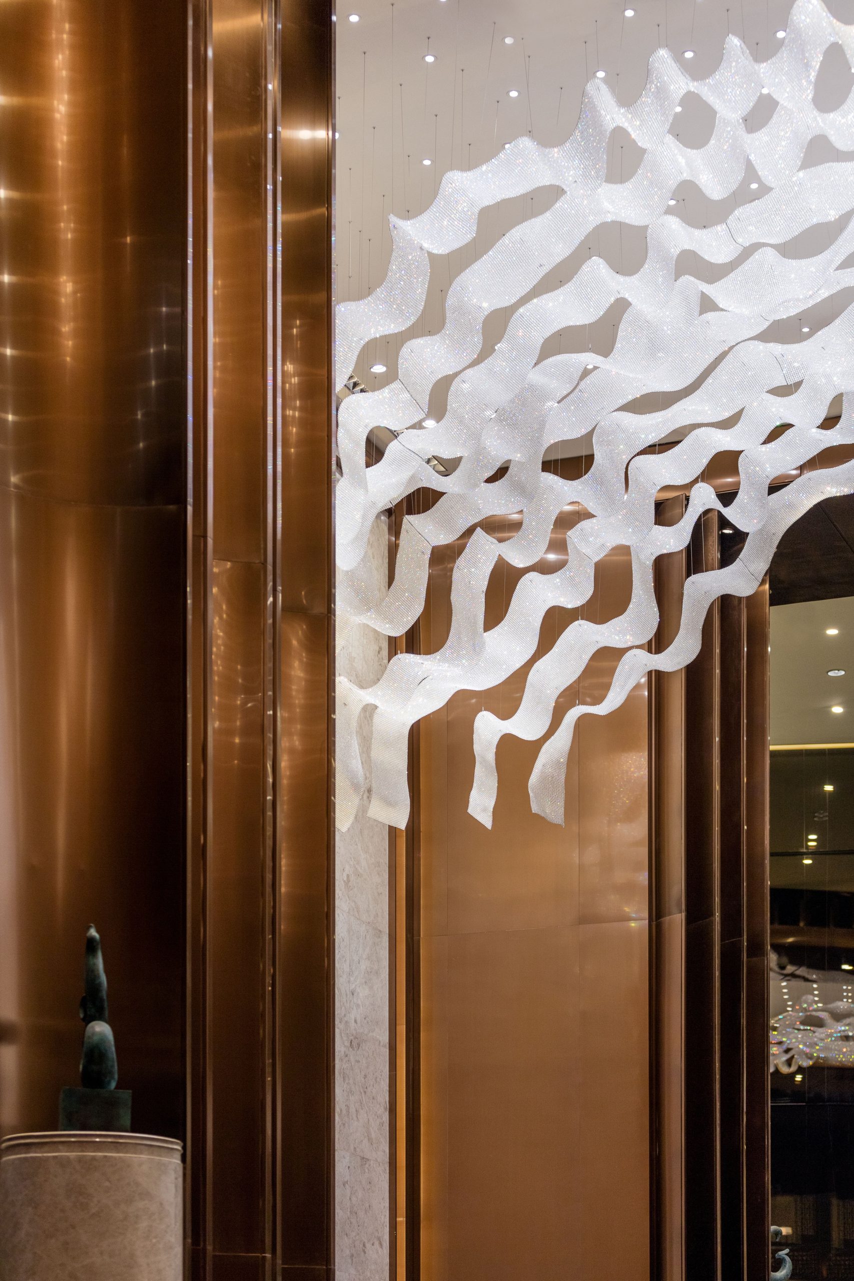 THALASSA ceiling installation, torn strip edges in close detail