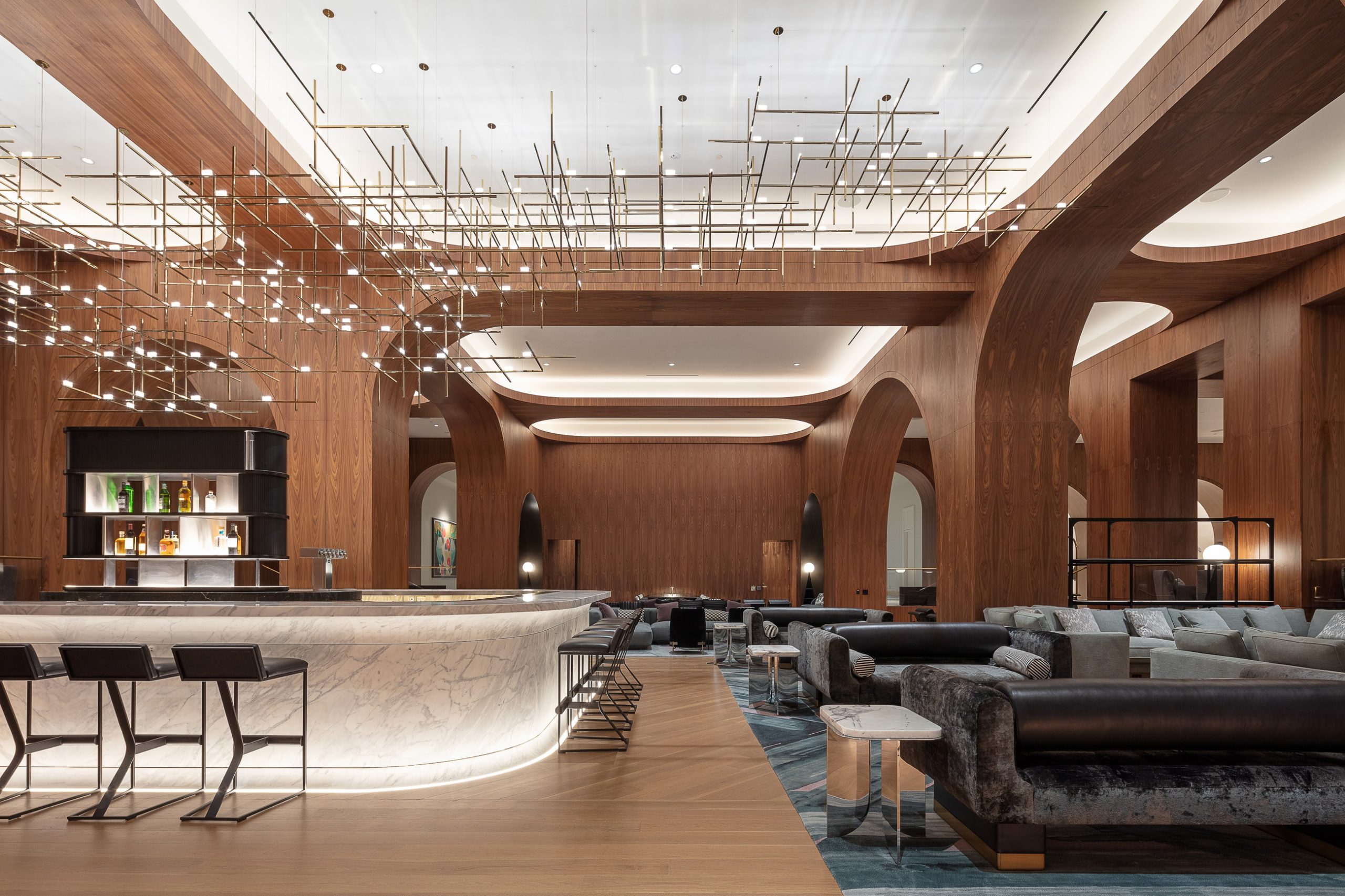 BECKETT custom lounge chandelier over a hotel reception lounge