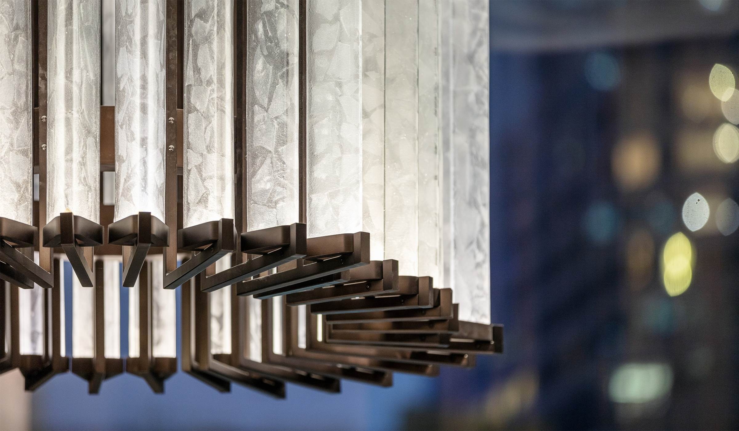 TITAN large acrylic chandelier by SHUCHUANG, full view in a hall / atrium