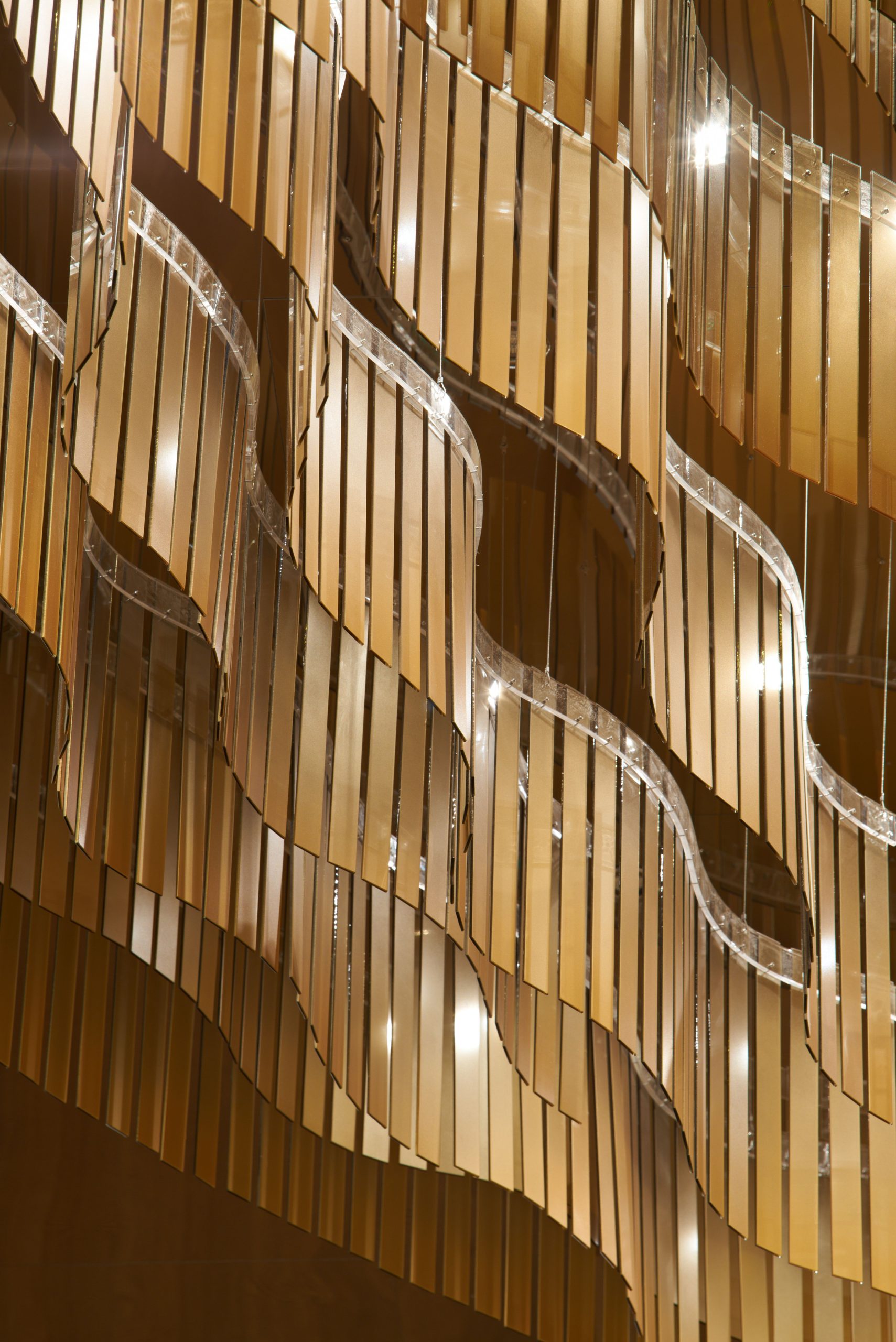 PAVILION chandelier, clear inserts running between the gilded blades