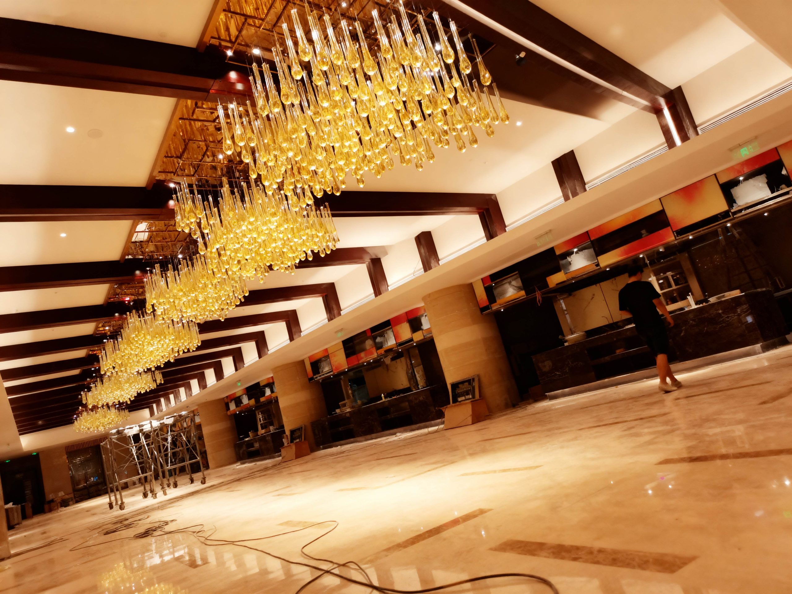 DEWDROP custom restaurant chandelier by SHUCHUANG, full view in a restaurant