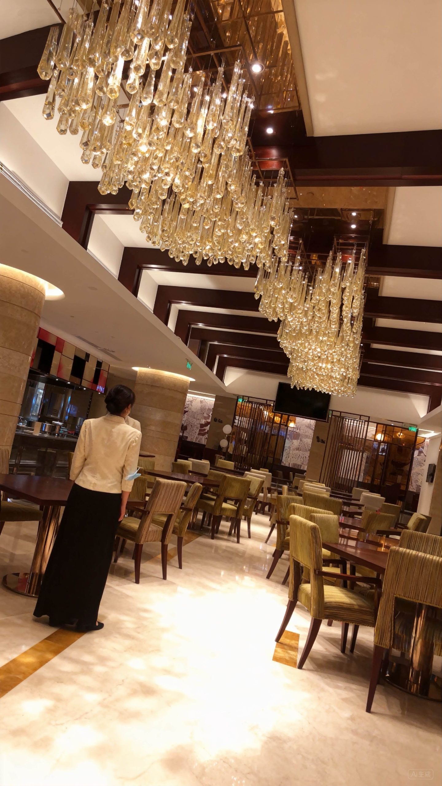 DEWDROP ceiling installation lit in the evening