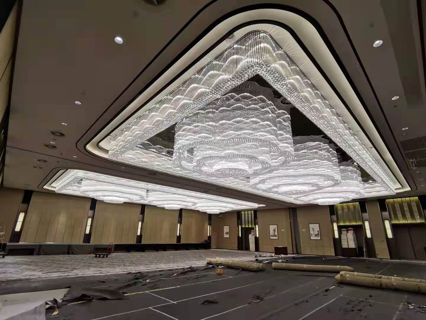 MANDALA lit in a ballroom, wide interior view