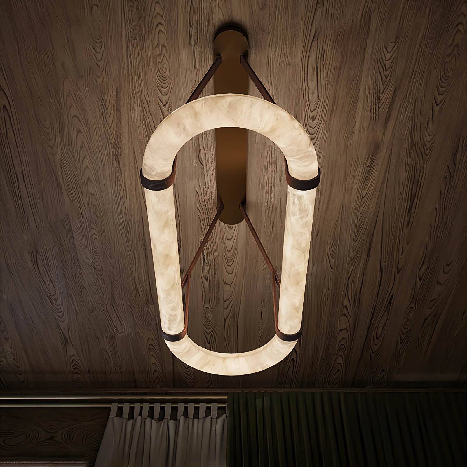 MILAN alabaster pendant light lit in a living room