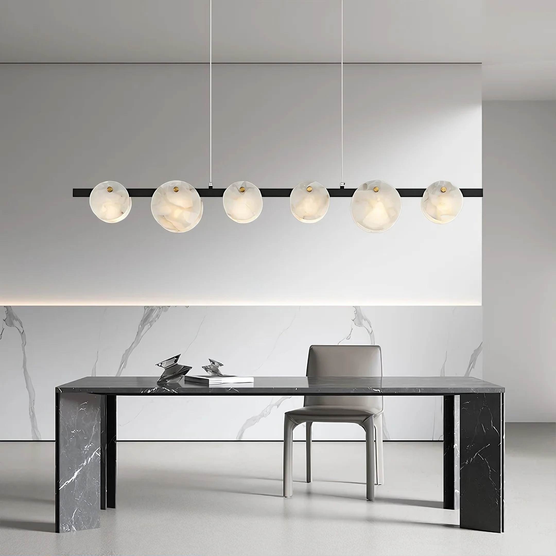ORION alabaster pendant light in a bedroom interior