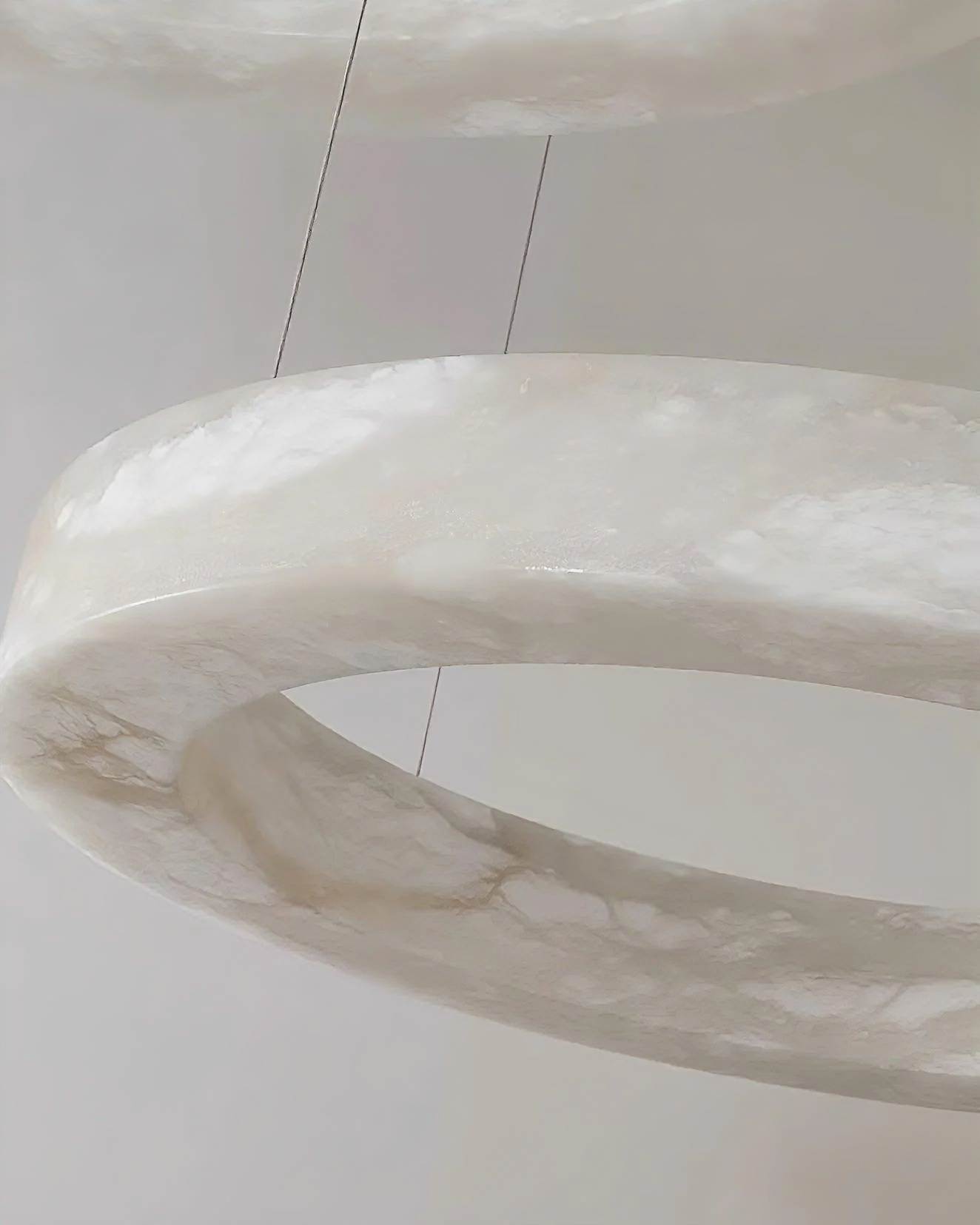 HELIOS alabaster pendant light, warm glow detail