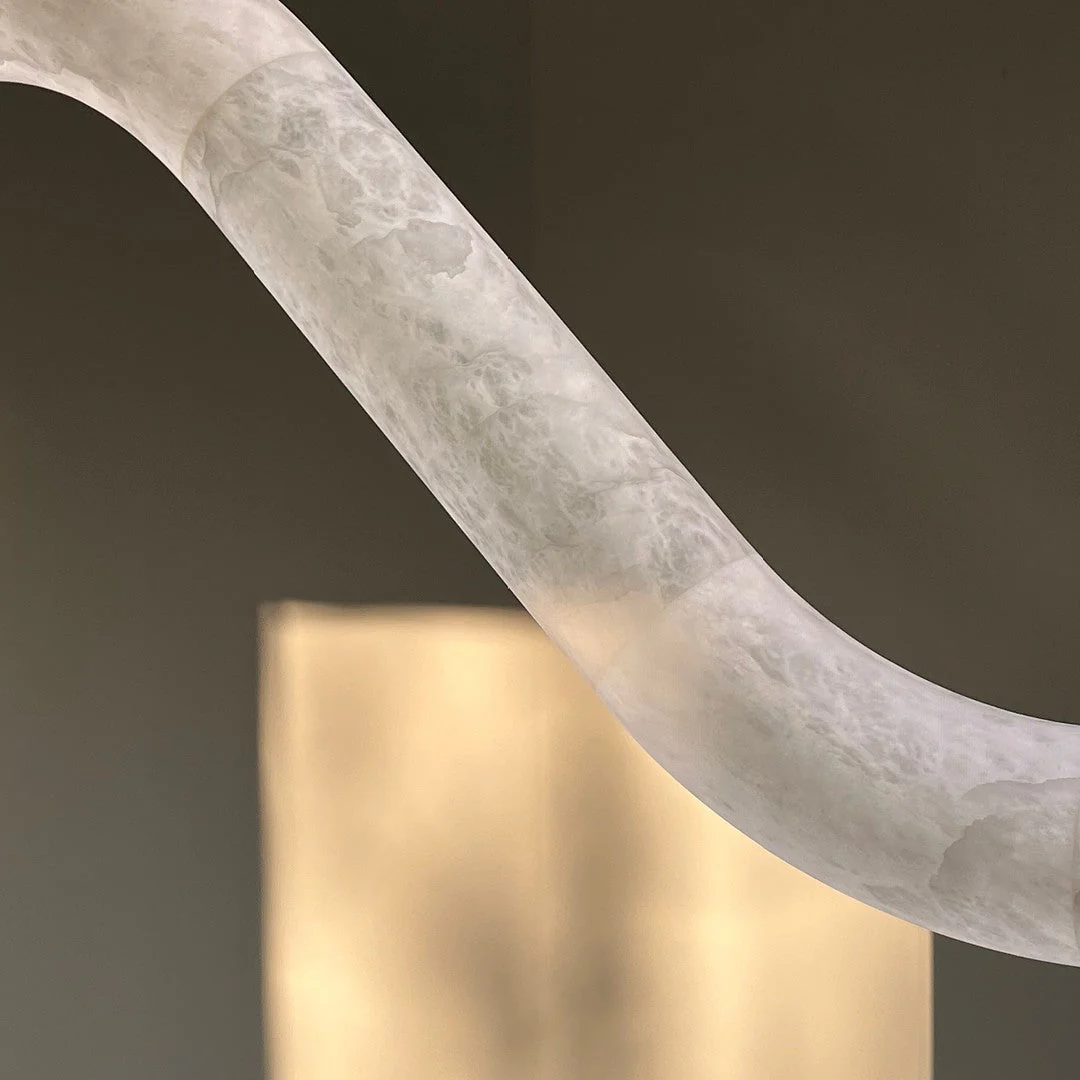 VENUS alabaster pendant light in a bedroom interior