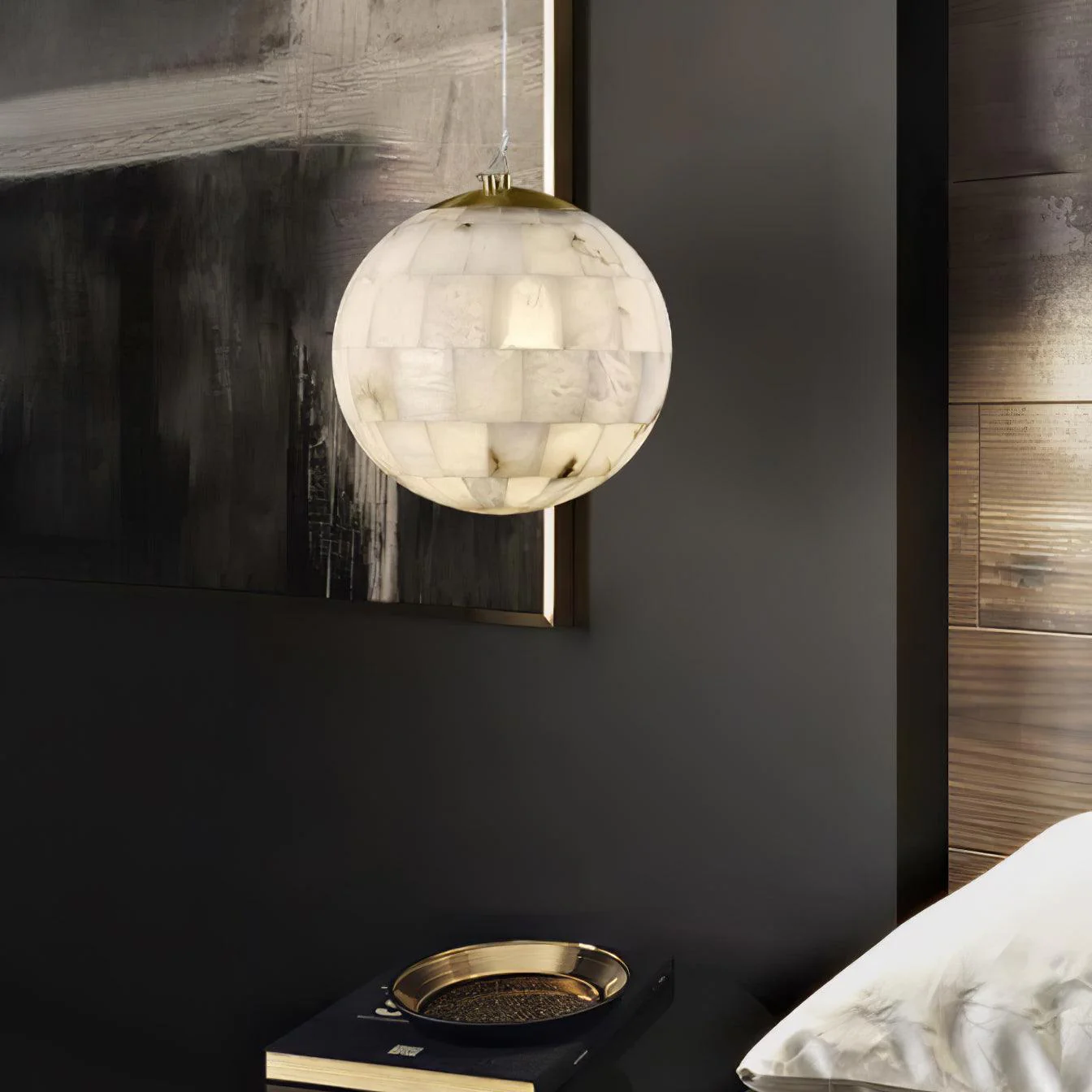 SEVILLE alabaster pendant light hanging over a dining table