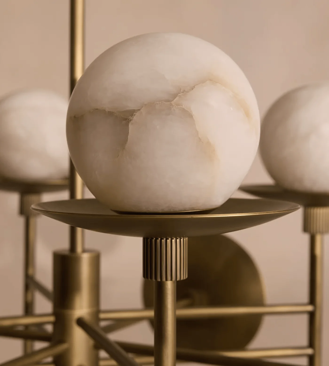 ARGO alabaster pendant light hanging over a dining table