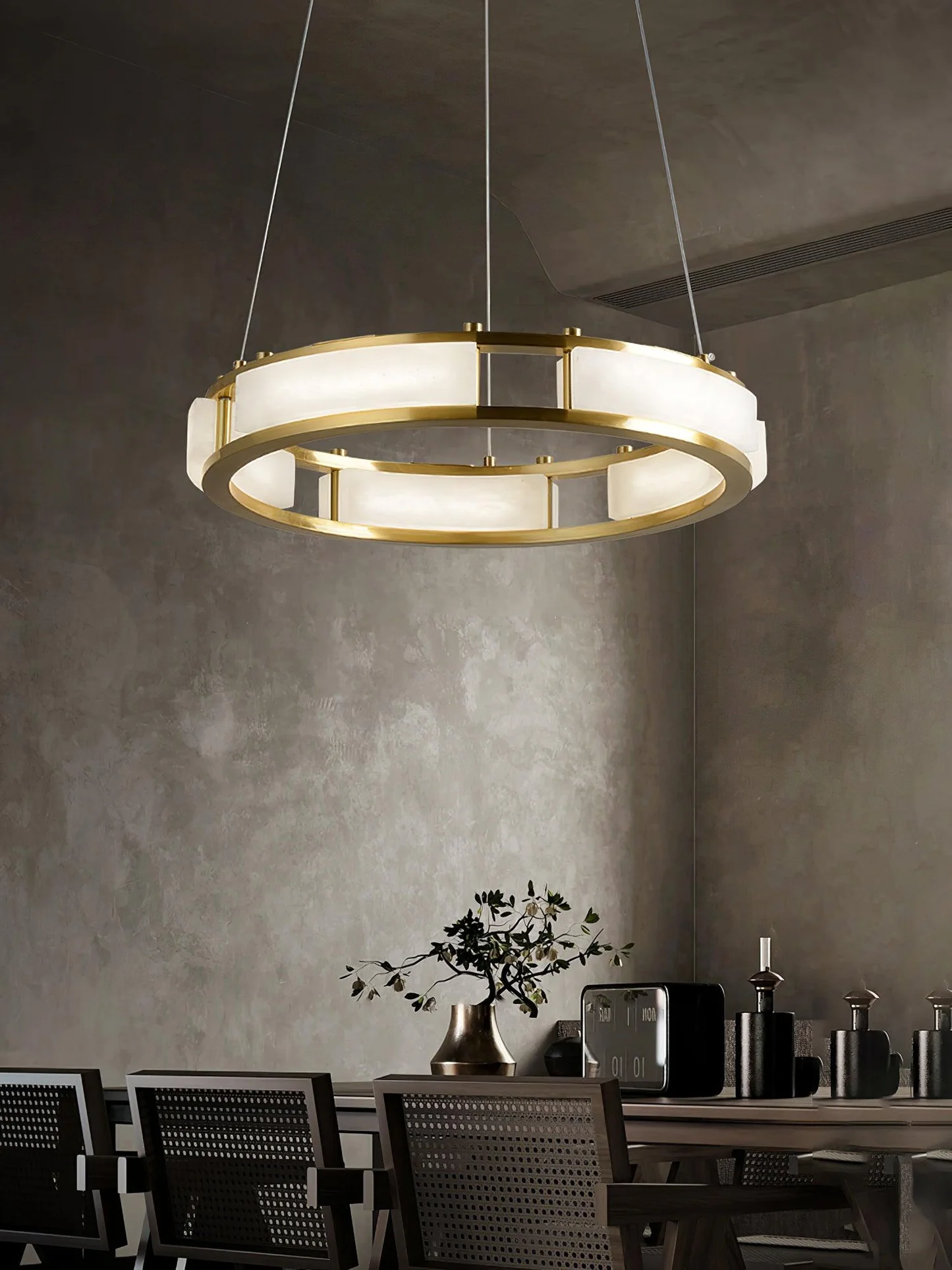 HARLOW alabaster Chandelier lit in a living room