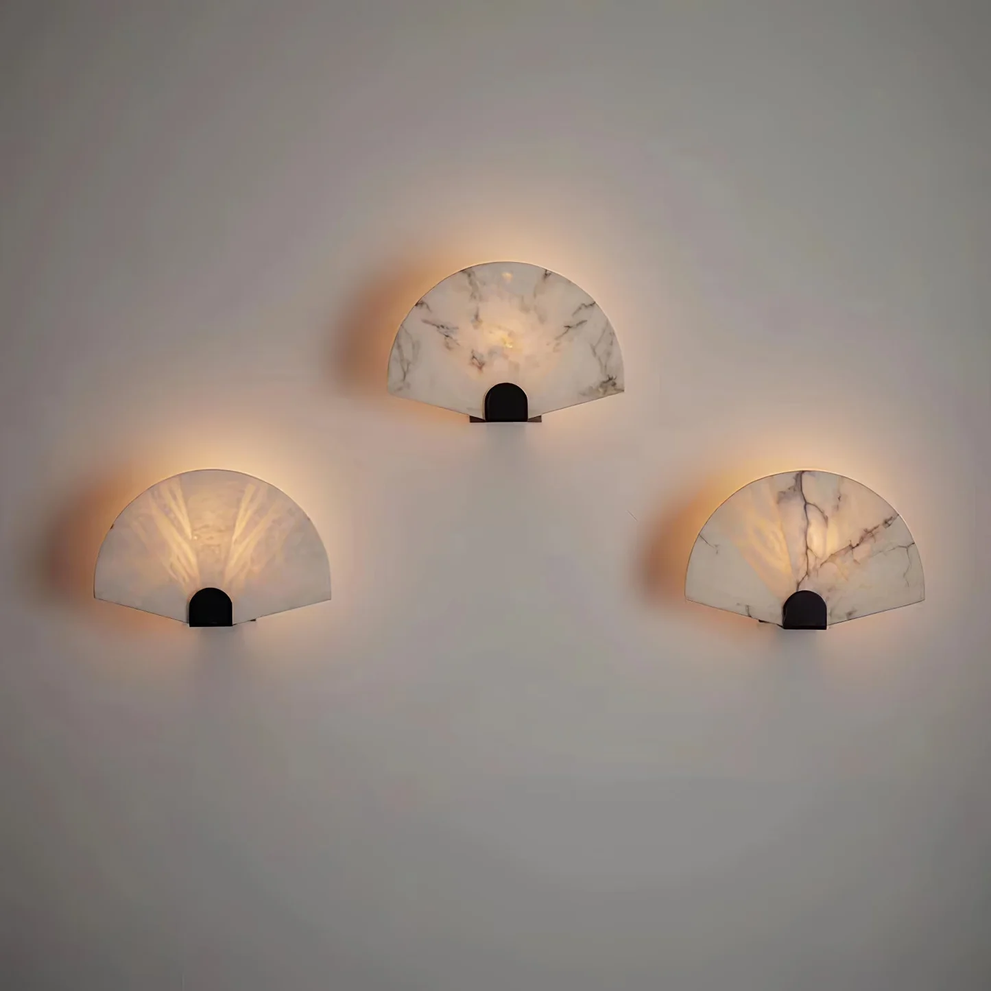 SOLEIL alabaster Wall sconce hanging over a dining table