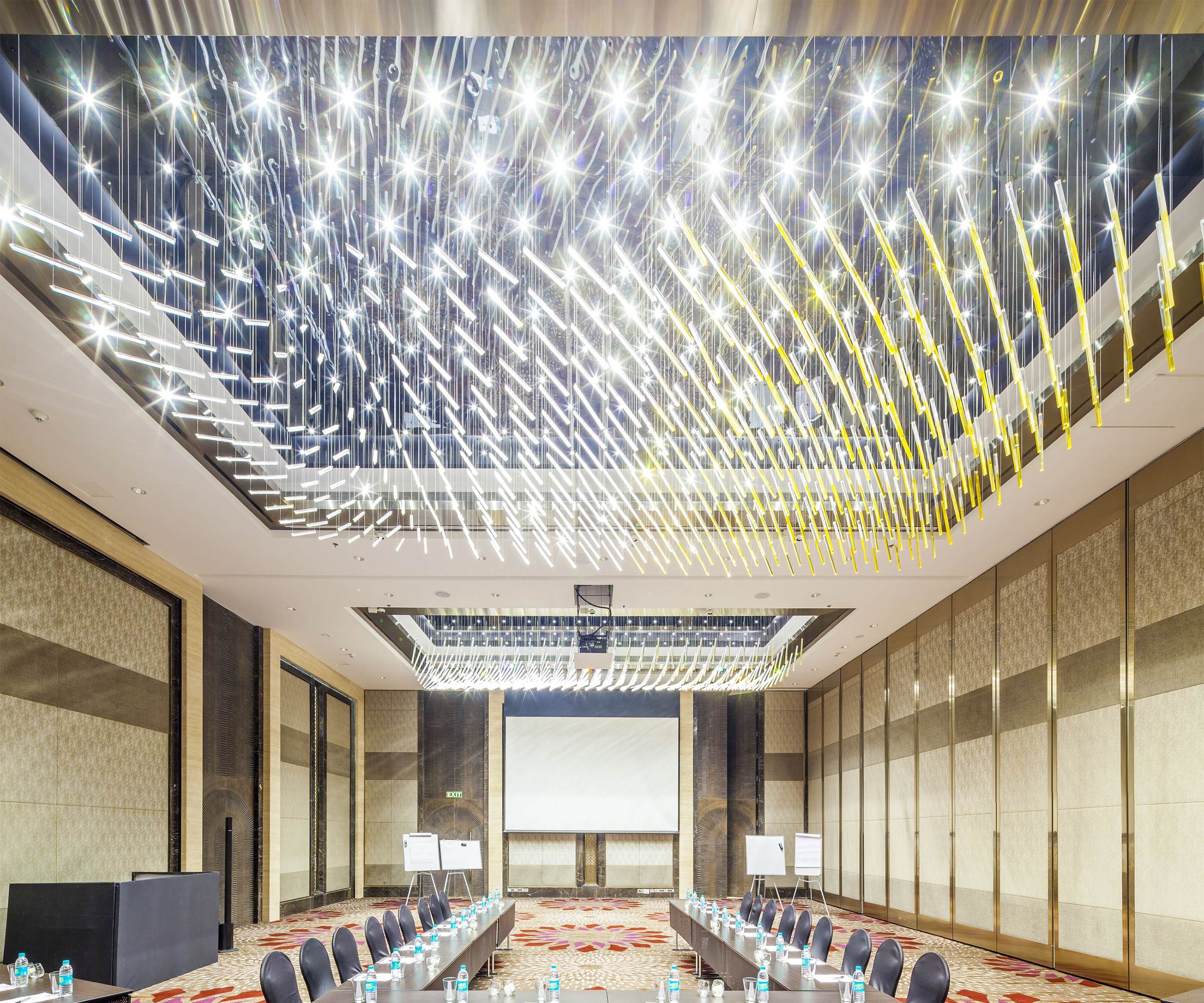 Custom hand-blown glass chandelier in a hotel lobby, Mumbai