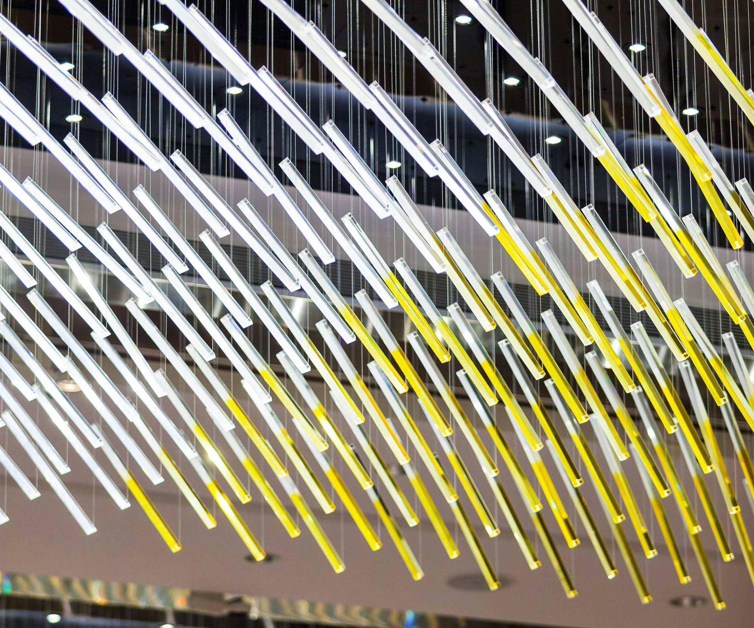 Suspended glass light fixture over a hotel reception, Mumbai