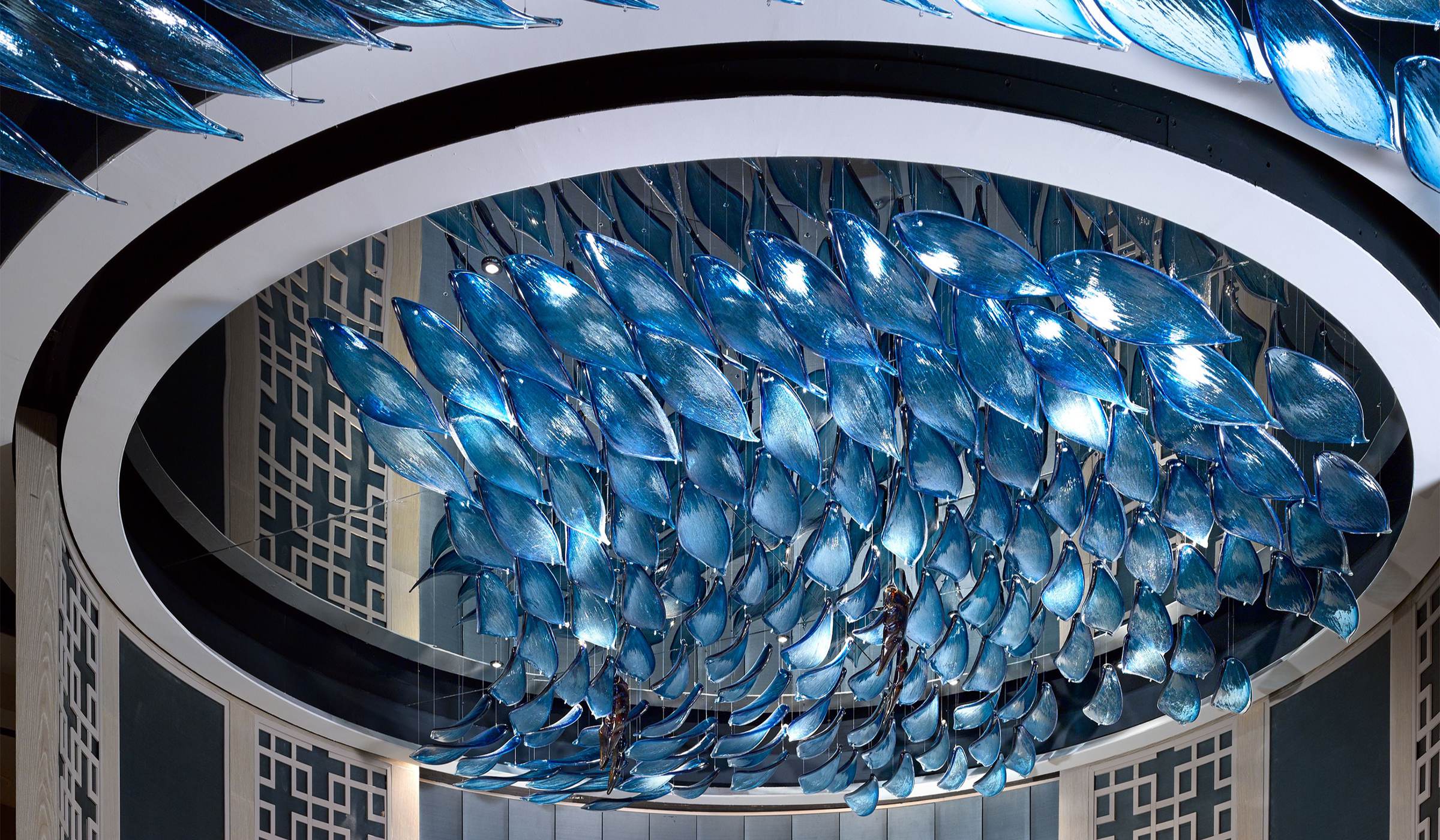 Layered glass light panels in a luxury hotel interior