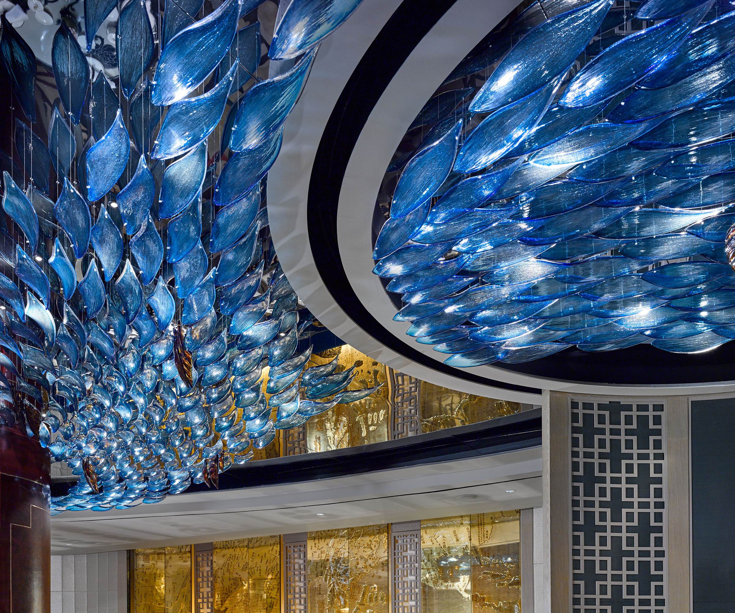 Detail of bespoke glass lighting in a hotel lobby, Jakarta