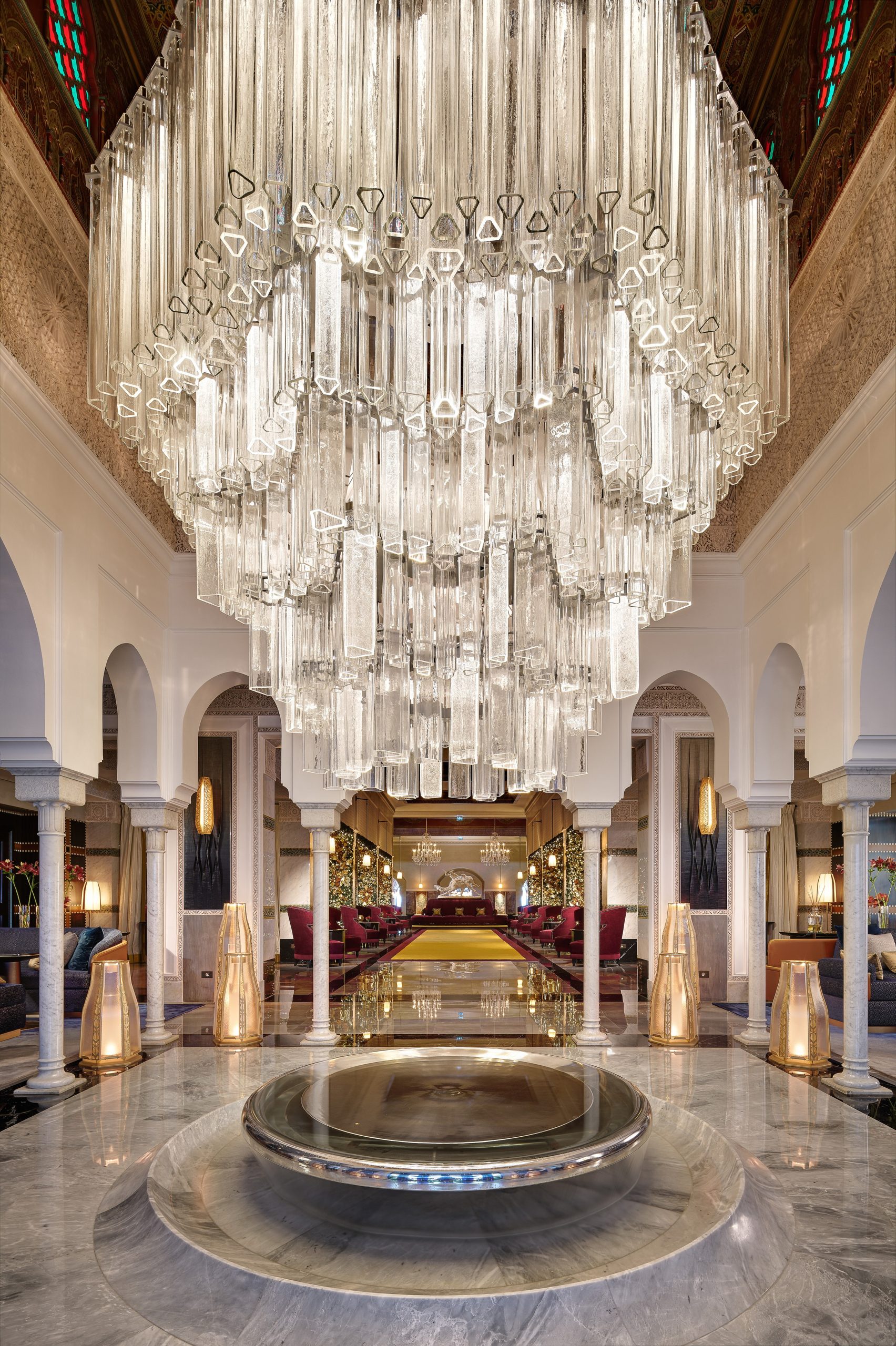 PRISM glass tube chandelier by SHUCHUANG, hung beneath a high arch